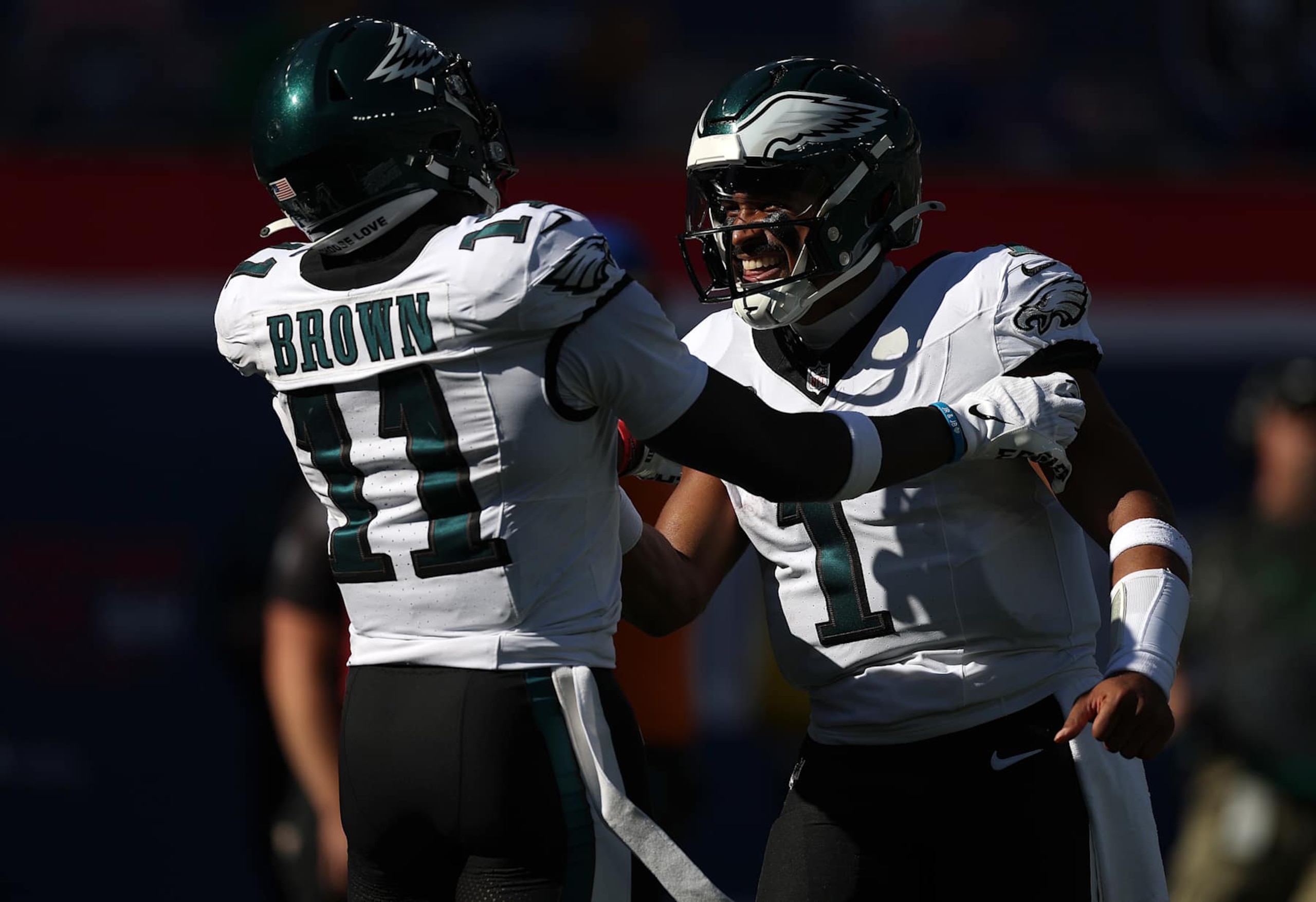 EAST RUTHERFORD, NEW JERSEY - OCTOBER 20: A.J. Brown #11 of the Philadelphia Eagles celebrates a touchdown with Jalen Hurts #1 during the second quarter against the New York Giants at MetLife Stadium on October 20, 2024 in East Rutherford, New Jersey. (Photo by Al Bello/Getty Images)