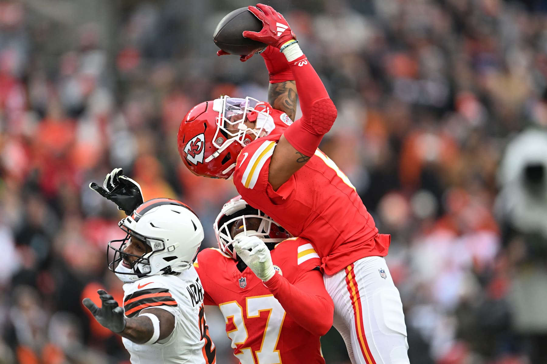CLEVELAND, OHIO - DECEMBER 15: Bryan Cook #6 of the Kansas City Chiefs intercepts a pass intended for Elijah Moore #8 of the Cleveland Browns during the first quarter at Huntington Bank Field on December 15, 2024 in Cleveland, Ohio. (Photo by Nick Cammett/Getty Images)