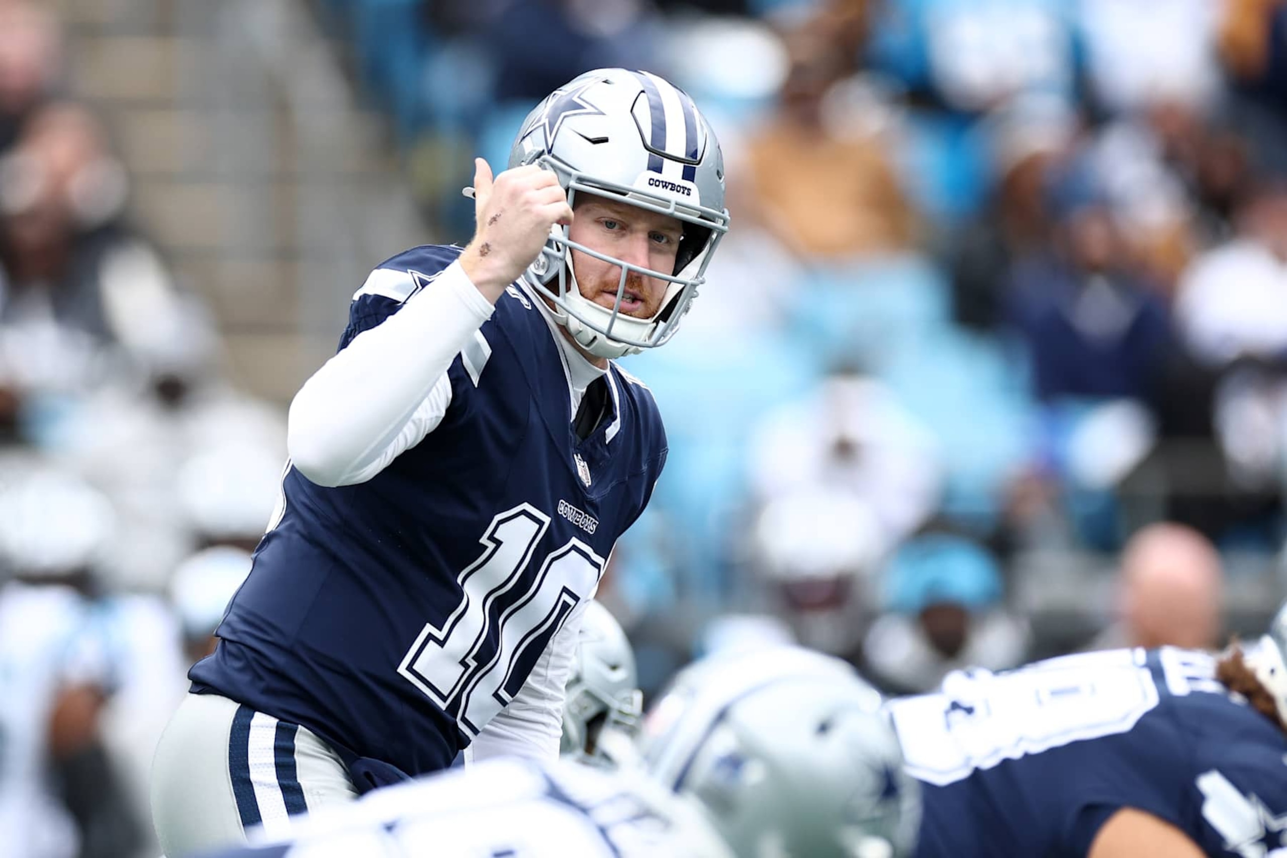 CHARLOTTE, NORTH CAROLINA - DECEMBER 15: Cooper Rush #10 of the Dallas Cowboys calls a play against the Carolina Panthers during the first quarter at Bank of America Stadium on December 15, 2024 in Charlotte, North Carolina. (Photo by Jared C. Tilton/Getty Images)