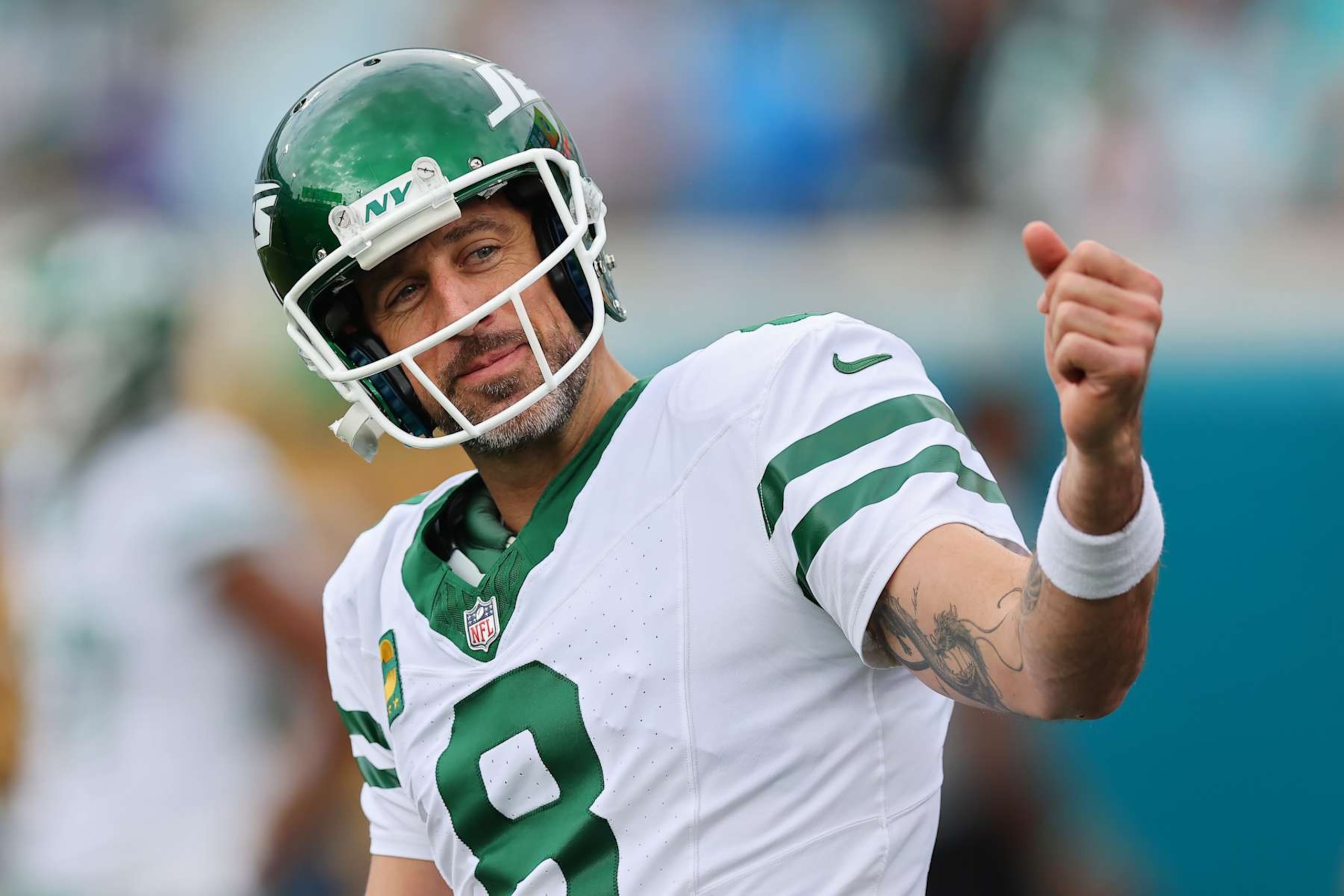 JACKSONVILLE, FLORIDA - DECEMBER 15: Aaron Rodgers #8 of the New York Jets looks on during warmups before the game against the Jacksonville Jaguars at EverBank Stadium on December 15, 2024 in Jacksonville, Florida. (Photo by Mike Carlson/Getty Images)