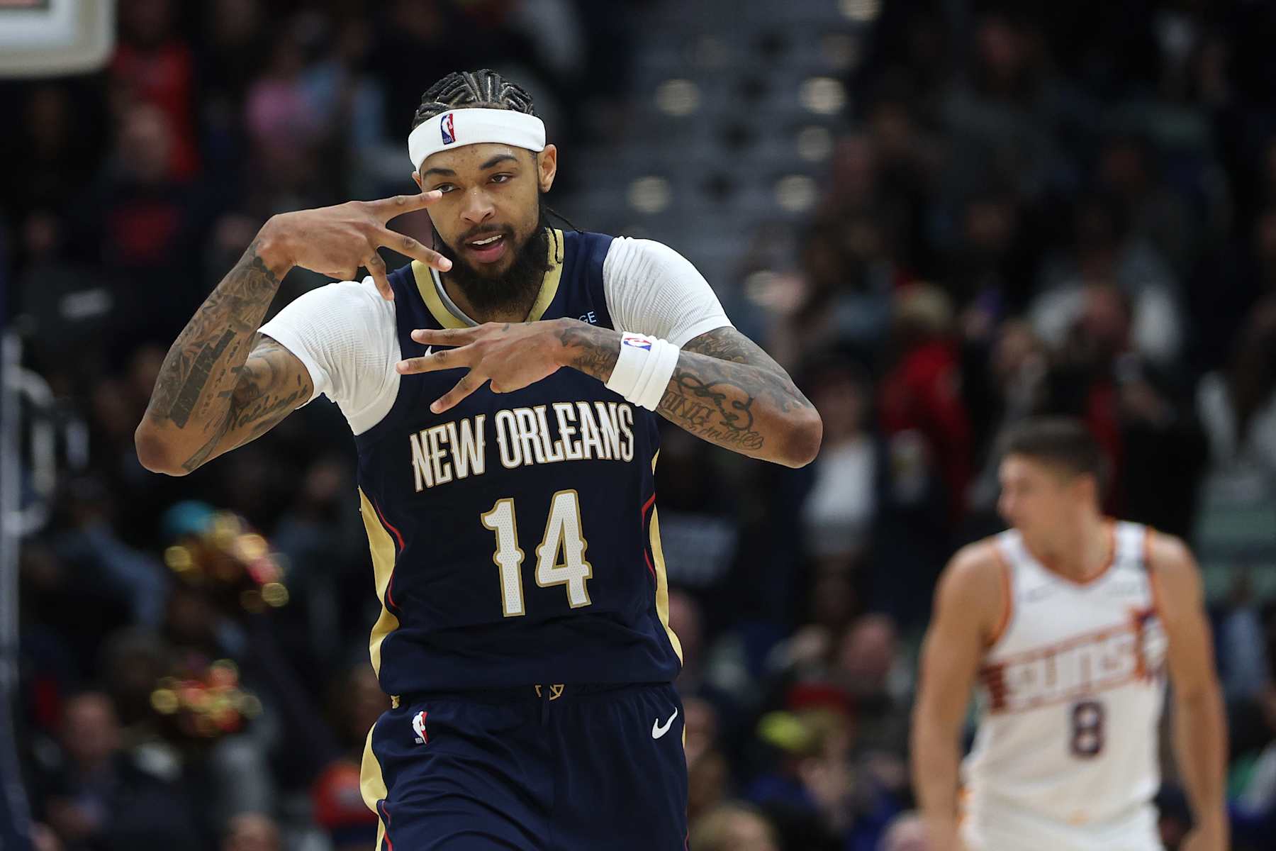 NEW ORLEANS, LOUISIANA - DECEMBER 05: Brandon Ingram #14 of the New Orleans Pelicans reacts during the game against the Phoenix Suns at Smoothie King Center on December 05, 2024 in New Orleans, Louisiana. NOTE TO USER: User expressly acknowledges and agrees that, by downloading and or using this photograph, User is consenting to the terms and conditions of the Getty Images License Agreement.  (Photo by Chris Graythen/Getty Images)
