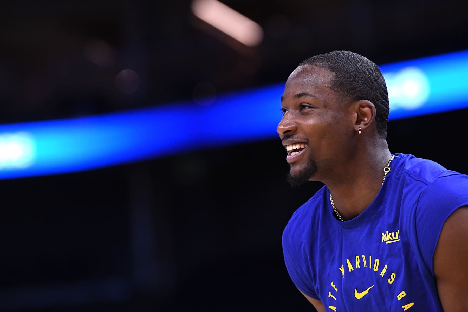 SAN FRANCISCO, CA - DECEMBER 15: Jonathan Kuminga #00 of the Golden State Warriors smiles before the game against the Dallas Mavericks on December 15, 2024 at Chase Center in San Francisco, California. NOTE TO USER: User expressly acknowledges and agrees that, by downloading and or using this photograph, user is consenting to the terms and conditions of Getty Images License Agreement. Mandatory Copyright Notice: Copyright 2024 NBAE (Photo by Noah Graham/NBAE via Getty Images)