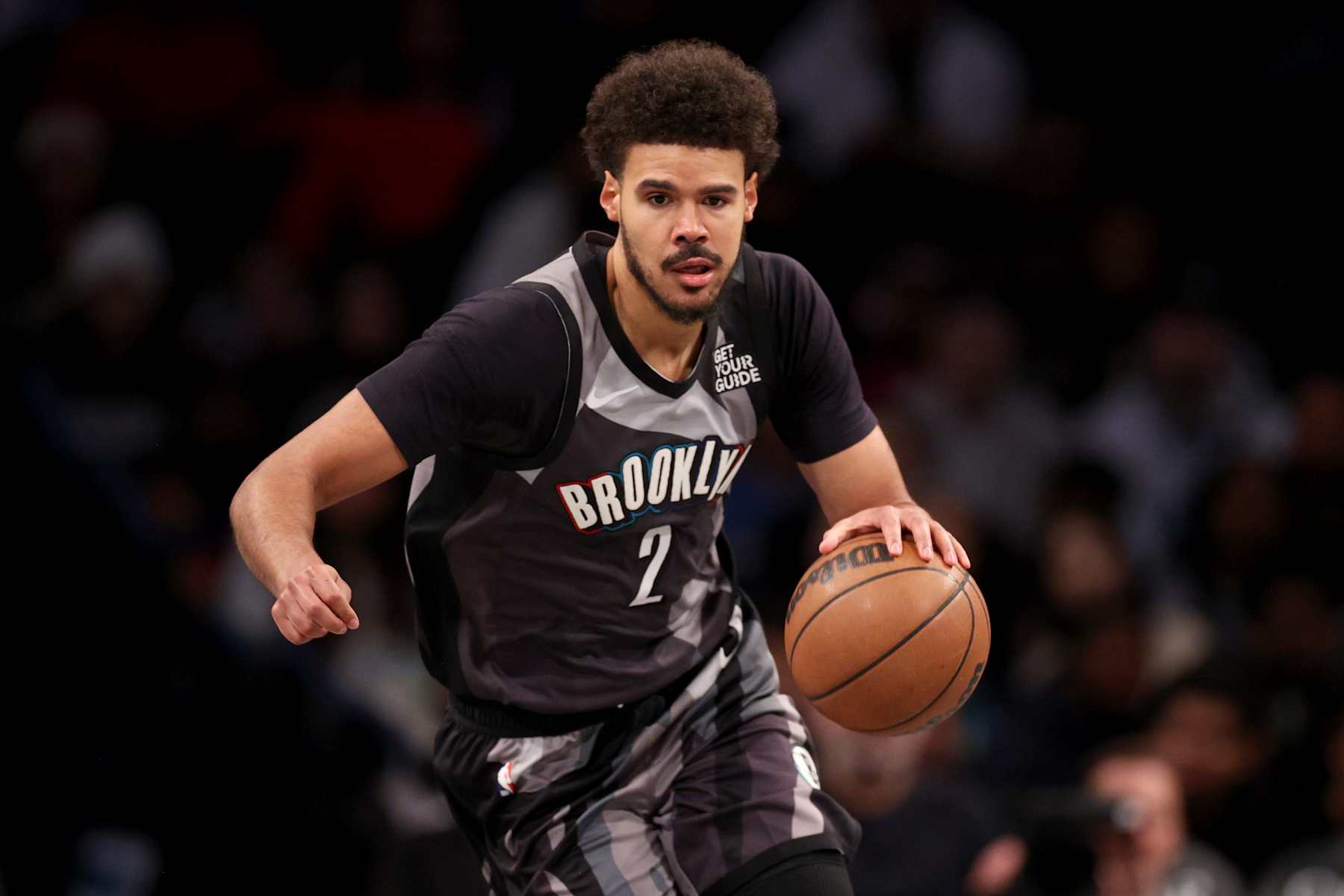 NEW YORK, NEW YORK - DECEMBER 01: Cameron Johnson #2 of the Brooklyn Nets dribbles the ball against the Orlando Magic during the first half at Barclays Center on December 01, 2024 in New York City. NOTE TO USER: User expressly acknowledges and agrees that, by downloading and or using this photograph, User is consenting to the terms and conditions of the Getty Images License Agreement. (Photo by Evan Bernstein/Getty Images)