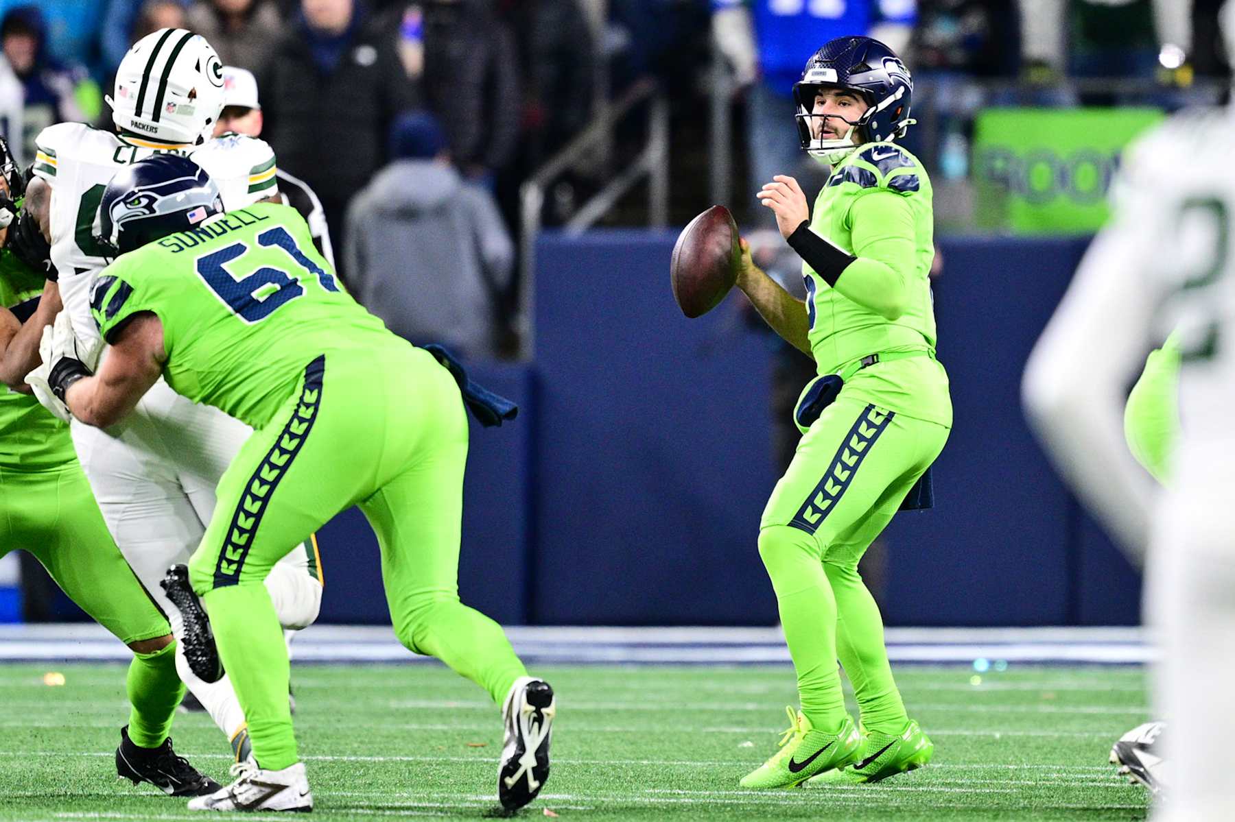 SEATTLE, WASHINGTON - DECEMBER 15: Sam Howell #6 of the Seattle Seahawks looks to pass against the Green Bay Packers during the fourth quarter of the game at Lumen Field on December 15, 2024 in Seattle, Washington. (Photo by Jane Gershovich/Getty Images)