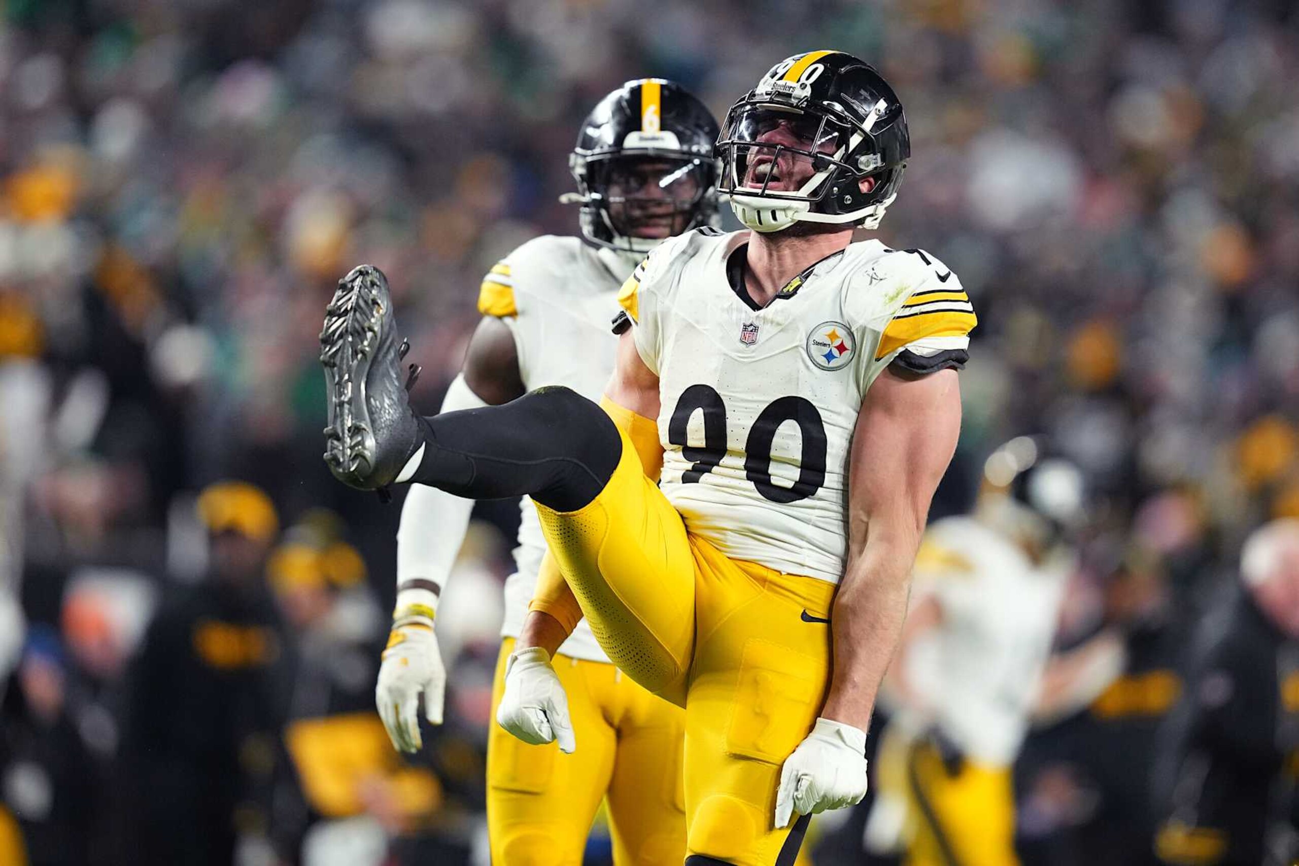 PHILADELPHIA, PENNSYLVANIA - DECEMBER 15: T.J. Watt #90 of the Pittsburgh Steelers reacts after a sack against the Philadelphia Eagles during the second quarter at Lincoln Financial Field on December 15, 2024 in Philadelphia, Pennsylvania. (Photo by Mitchell Leff/Getty Images)