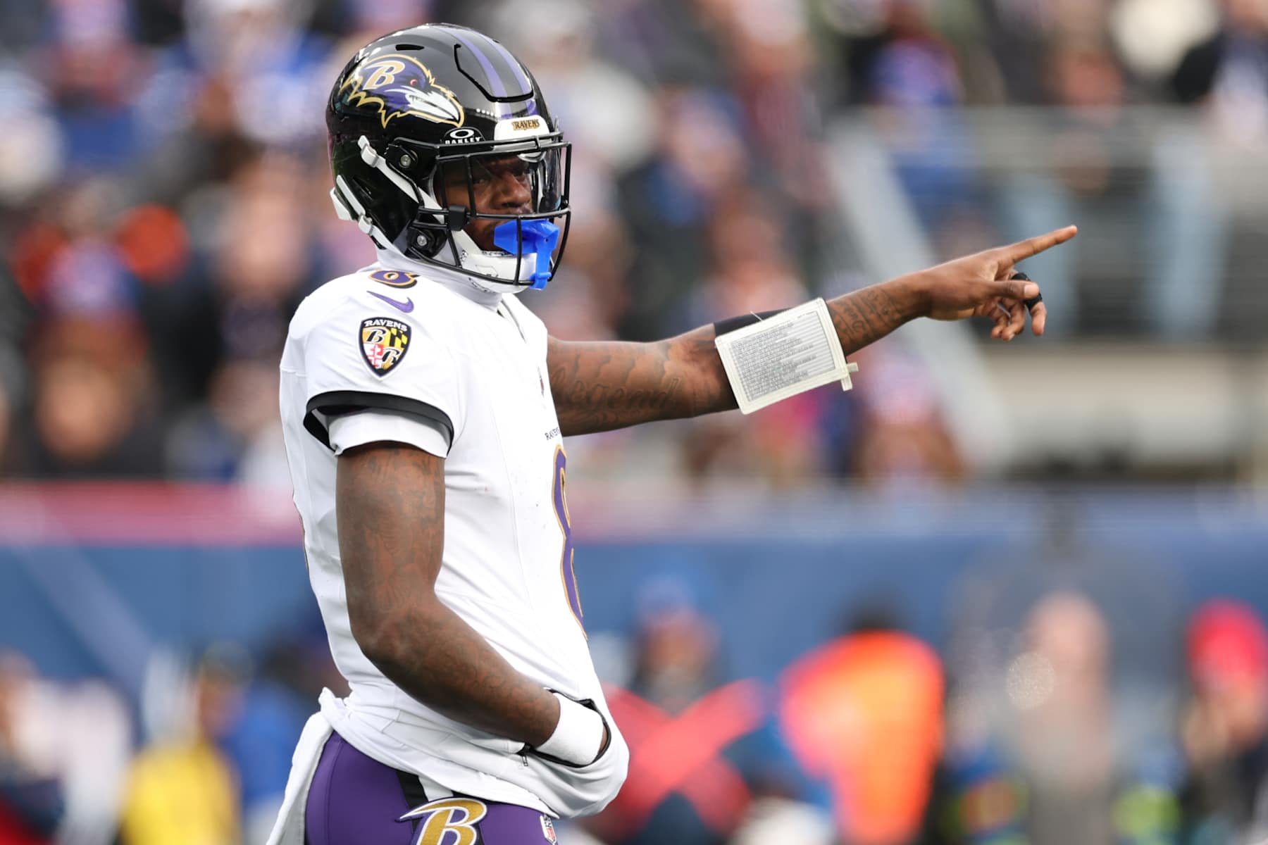 EAST RUTHERFORD, NEW JERSEY - DECEMBER 15: Lamar Jackson #8 of the Baltimore Ravens looks on during the first quarter of a game against the New York Giants at MetLife Stadium on December 15, 2024 in East Rutherford, New Jersey. (Photo by Luke Hales/Getty Images)