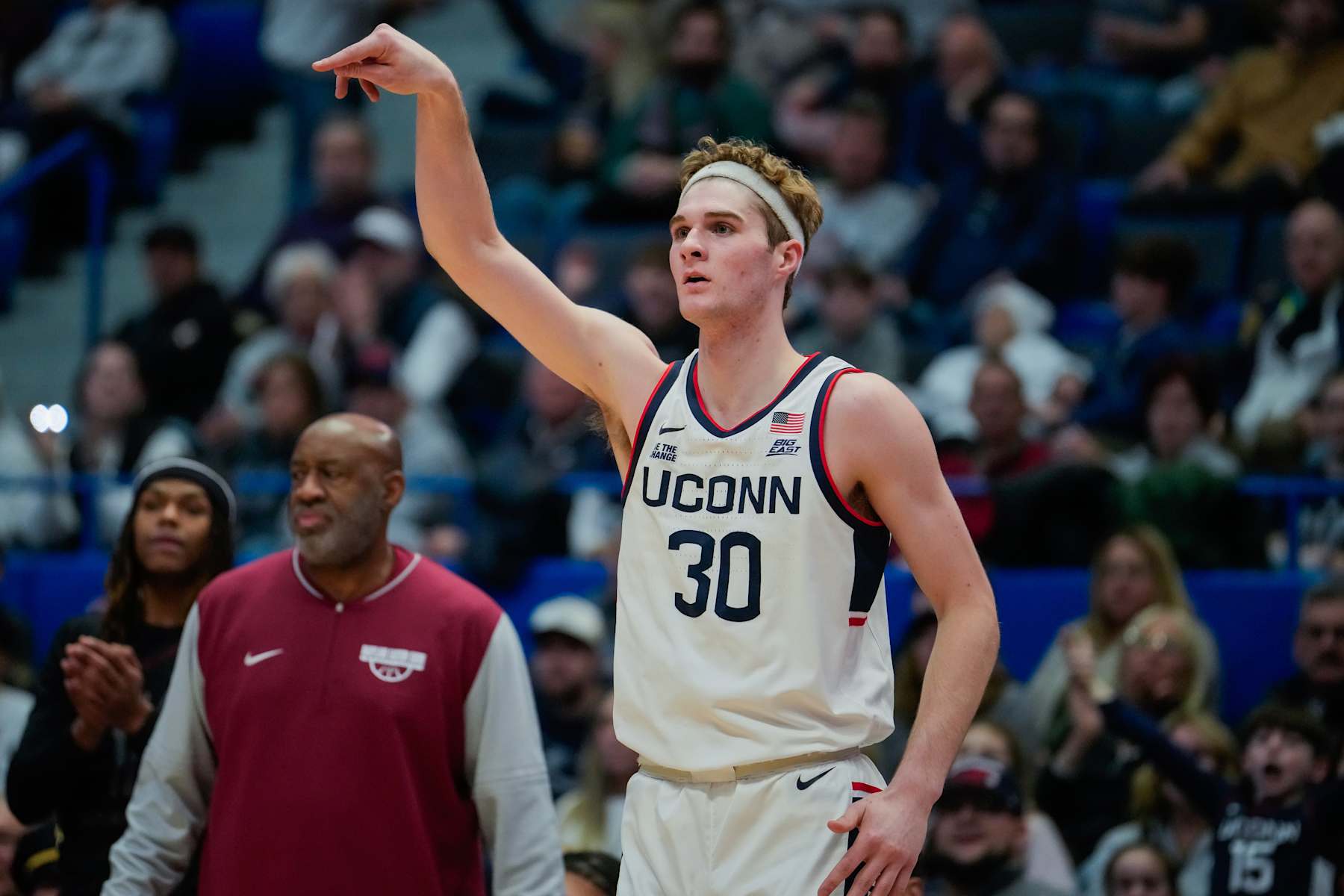 HARTFORD, CONNECTICUT - NOVEMBER 30: Liam McNeeley #30 of the Connecticut Huskies plays against the Maryland Eastern Shore Hawks during the first half of an NCAA basketball game at the XL Center on November 30, 2024 in Hartford, Connecticut. (Photo by Joe Buglewicz/Getty Images)