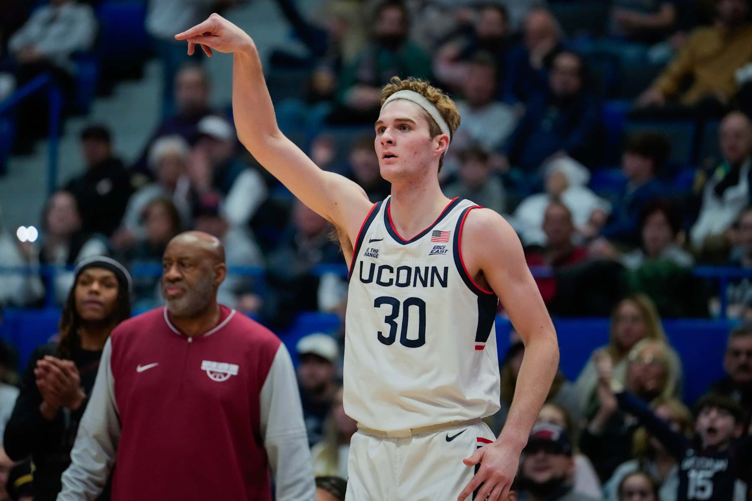 HARTFORD, CONNECTICUT - NOVEMBER 30: Liam McNeeley #30 of the Connecticut Huskies plays against the Maryland Eastern Shore Hawks during the first half of an NCAA basketball game at the XL Center on November 30, 2024 in Hartford, Connecticut. (Photo by Joe Buglewicz/Getty Images)