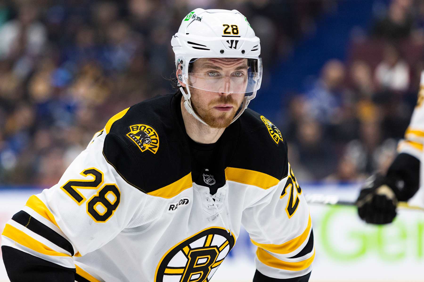 VANCOUVER, BC - DECEMBER 14: Boston Bruins center Elias Lindholm (28) waiting for face-off during an NHL game between the Boston Bruins and the Vancouver Canucks on Saturday December 14, 2024 at Rogers Arena in Vancouver, B.C. (Photo by Jamie Douglas/Icon Sportswire via Getty Images)