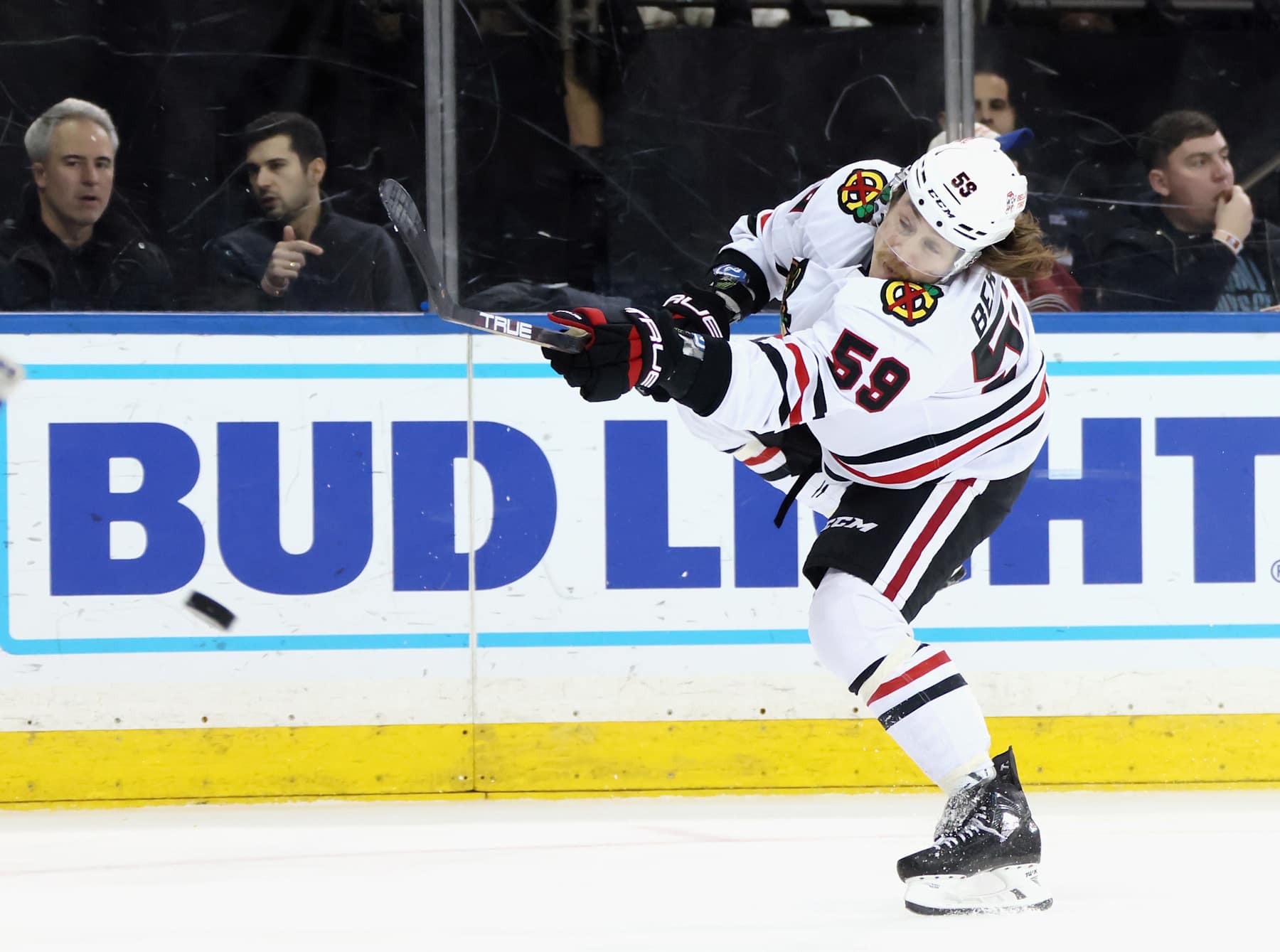NEW YORK, NEW YORK - DECEMBER 09: Tyler Bertuzzi #59 of the Chicago Blackhawks takes a first period shot against the New York Rangers at Madison Square Garden on December 09, 2024 in New York City. (Photo by Bruce Bennett/Getty Images)