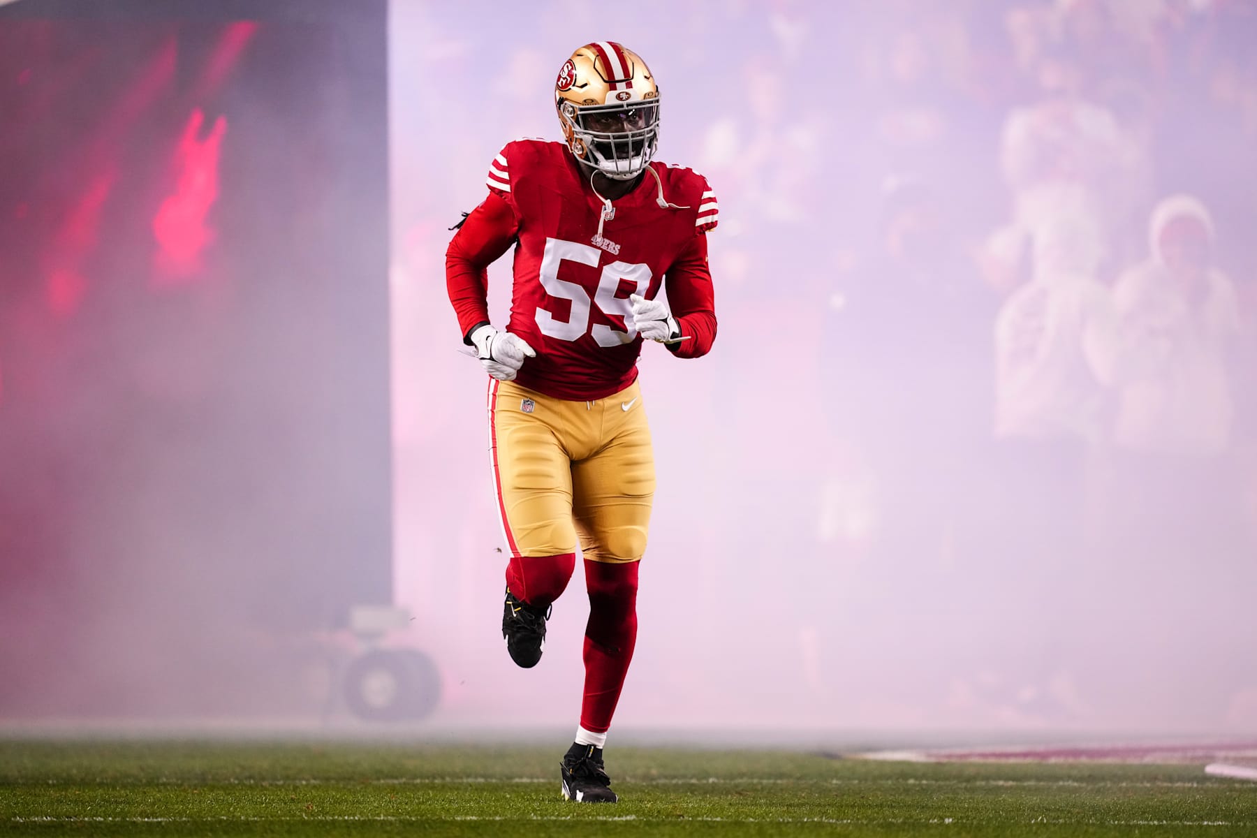 SANTA CLARA, CA - DECEMBER 12: De'Vondre Campbell #59 of the San Francisco 49ers runs out of the tunnel prior to an NFL football game against the Los Angeles Rams at Levi's Stadium on December 12, 2024 in Santa Clara, California. (Photo by Cooper Neill/Getty Images)