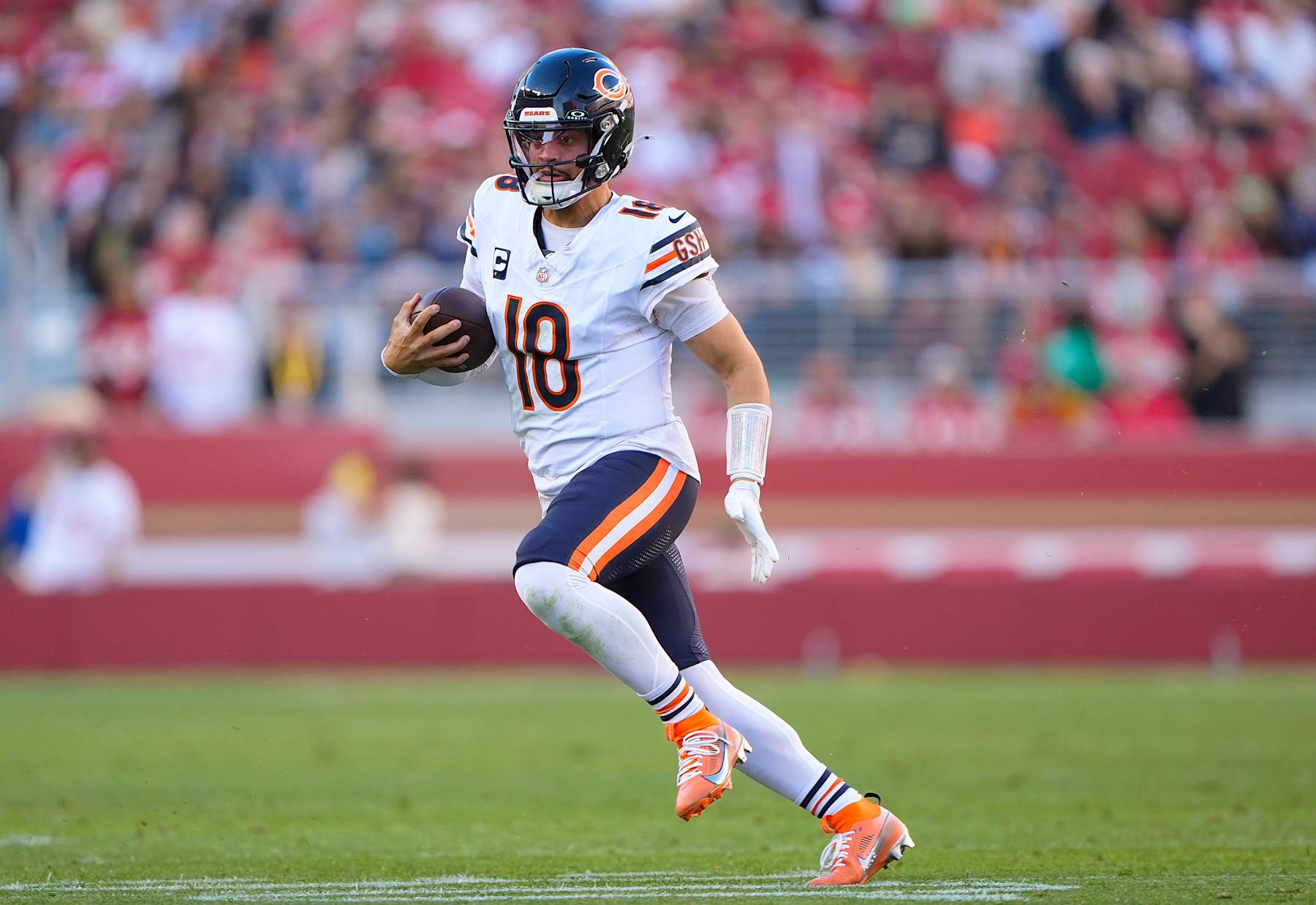SANTA CLARA, CALIFORNIA - DECEMBER 08: Caleb Williams #18 of the Chicago Bears runs with the ball against the San Francisco 49ers in the third quarter at Levi's Stadium on December 08, 2024 in Santa Clara, California. (Photo by Thearon W. Henderson/Getty Images)