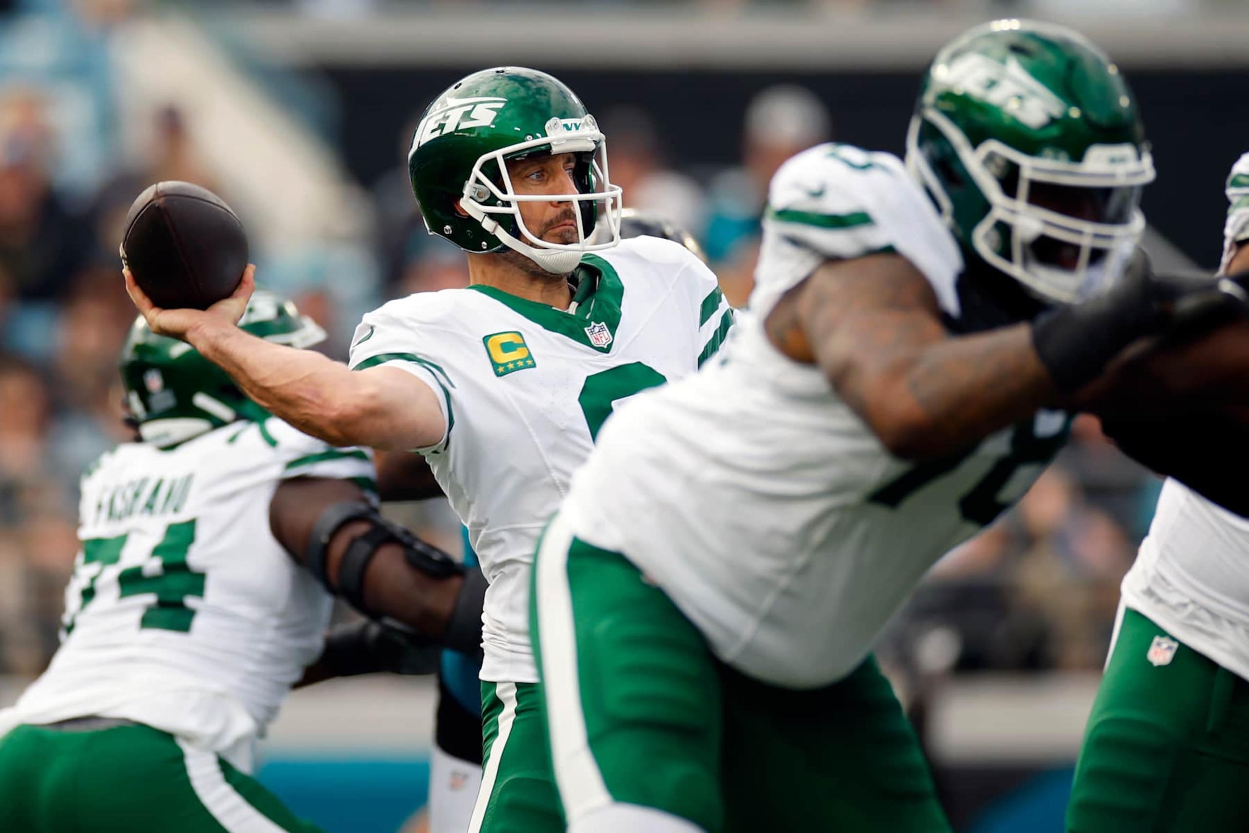 JACKSONVILLE, FLORIDA - DECEMBER 15: Aaron Rodgers #8 of the New York Jets throws a pass against the Jacksonville Jaguars during the second quarter at EverBank Stadium on December 15, 2024 in Jacksonville, Florida. (Photo by Mike Ehrmann/Getty Images)