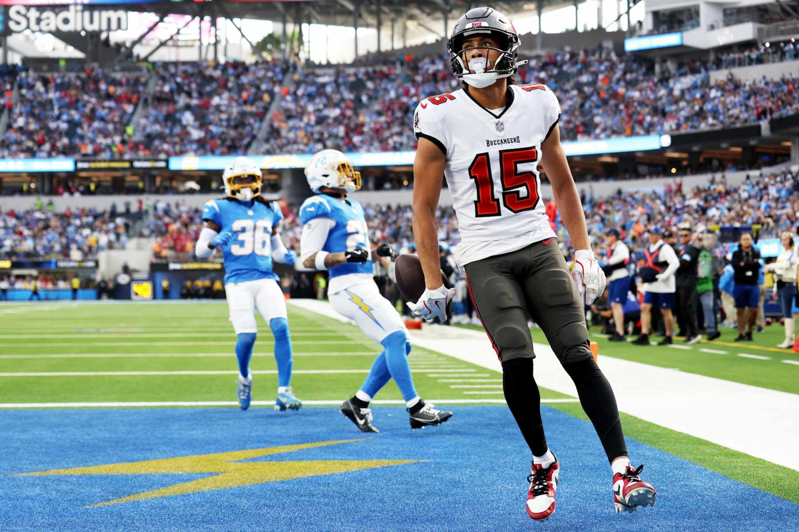 INGLEWOOD, CALIFORNIA - DECEMBER 15: Jalen McMillan #15 of the Tampa Bay Buccaneers celebrates a touchdown in the first quarter of the game against the Los Angeles Chargers at SoFi Stadium on December 15, 2024 in Inglewood, California. (Photo by Harry How/Getty Images)