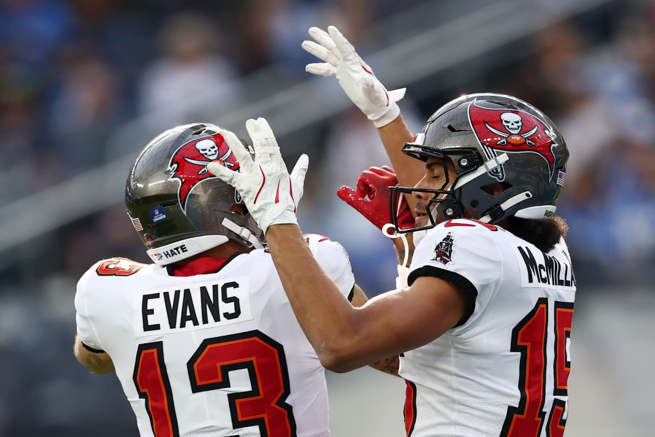 INGLEWOOD, CALIFORNIA - DECEMBER 15: Jalen McMillan #15 celebrates his touchdown with teammate Mike Evans #13 of the Tampa Bay Buccaneers  in the first quarter of the game against the Los Angeles Chargers  at SoFi Stadium on December 15, 2024 in Inglewood, California. (Photo by Katelyn Mulcahy/Getty Images)