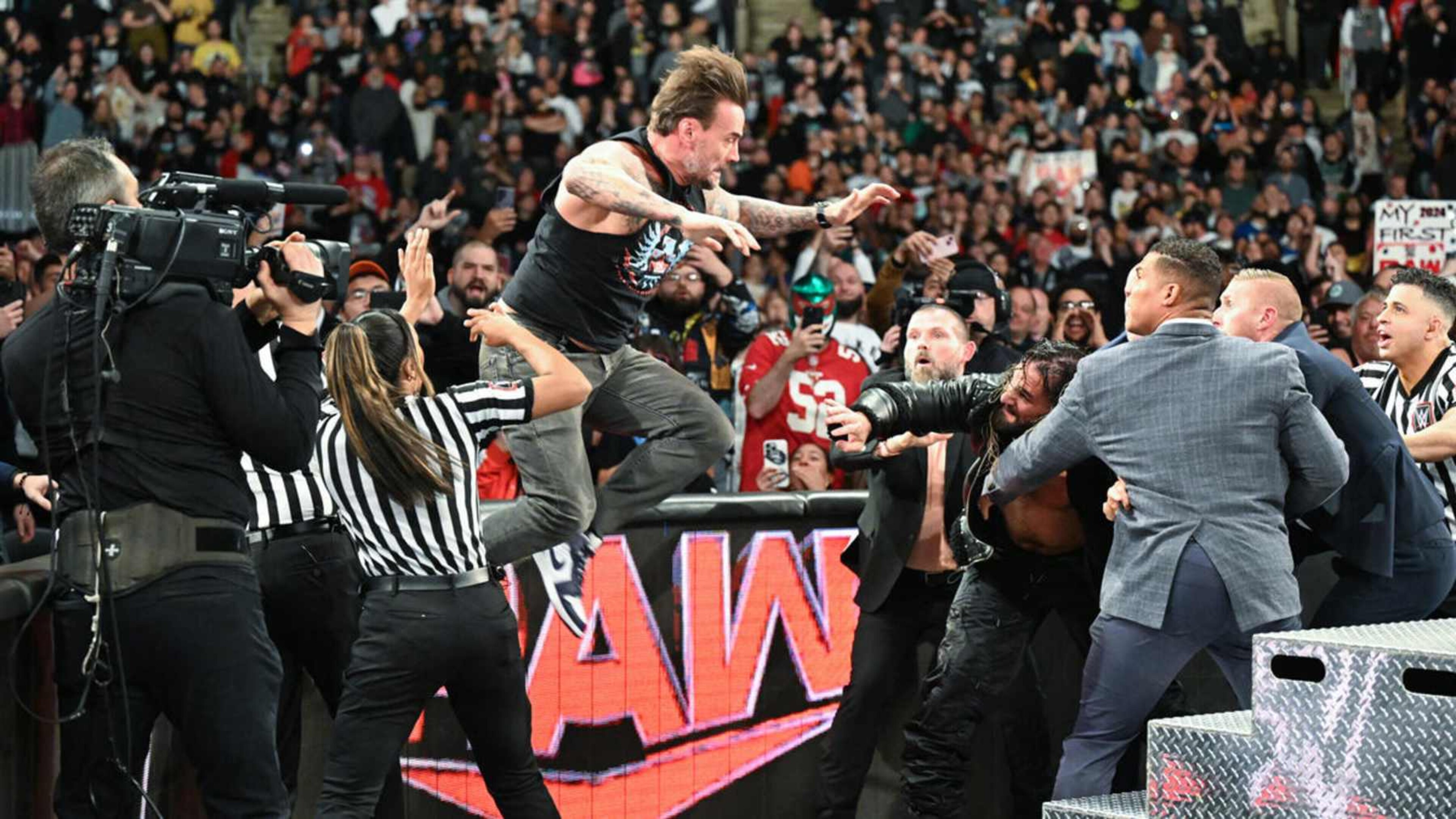 Officials struggled to keep CM Punk and Seth Rollins away from each other on Monday night. Officials struggled to keep CM Punk and Seth Rollins away from each other on Monday night.