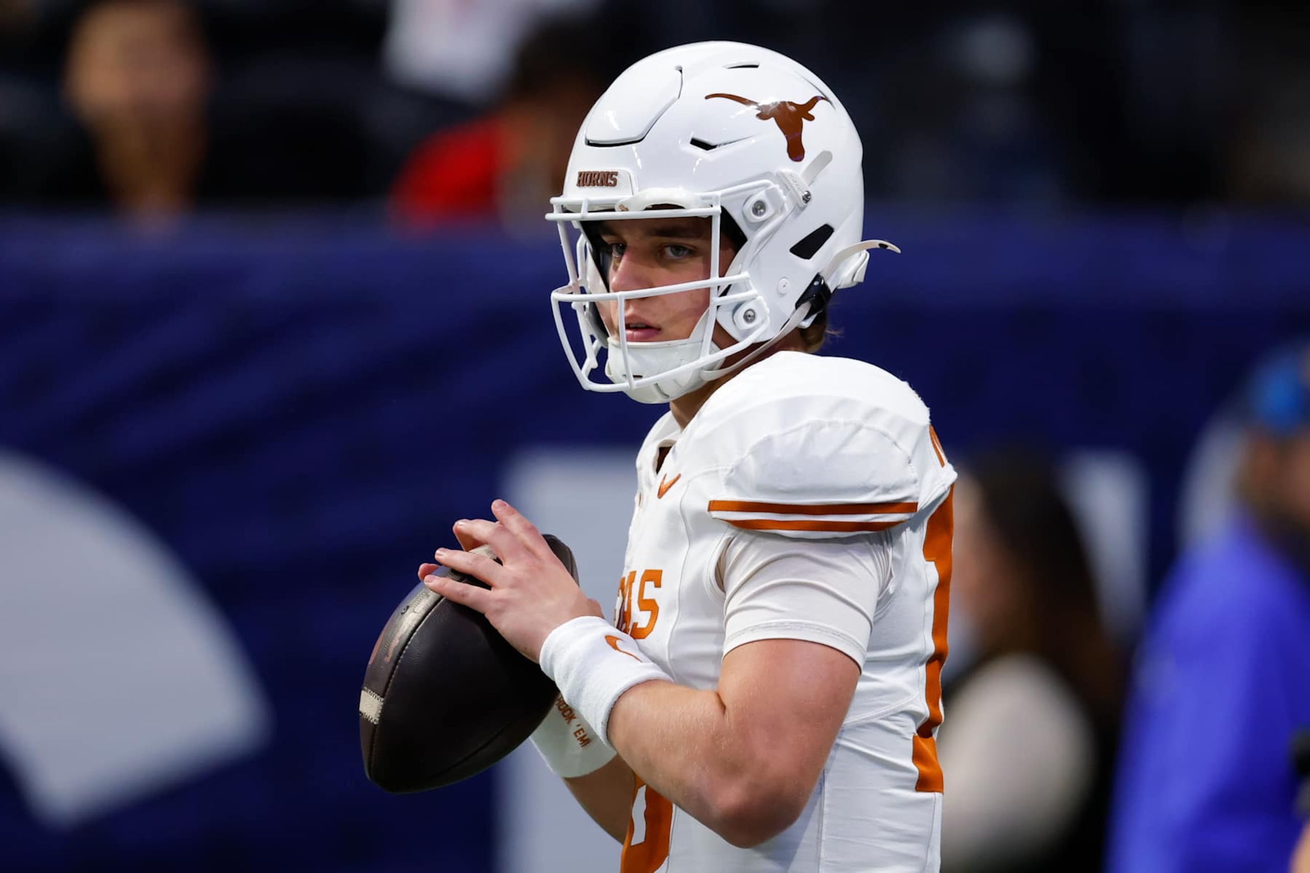 ATLANTA, GEORGIA - DECEMBER 7: Arch Manning #16 of the Texas Longhorns warms up prior to the game against the Georgia Bulldogs in the 2024 SEC Championship at Mercedes-Benz Stadium on December 7, 2024 in Atlanta, Georgia. (Photo by Todd Kirkland/Getty Images)