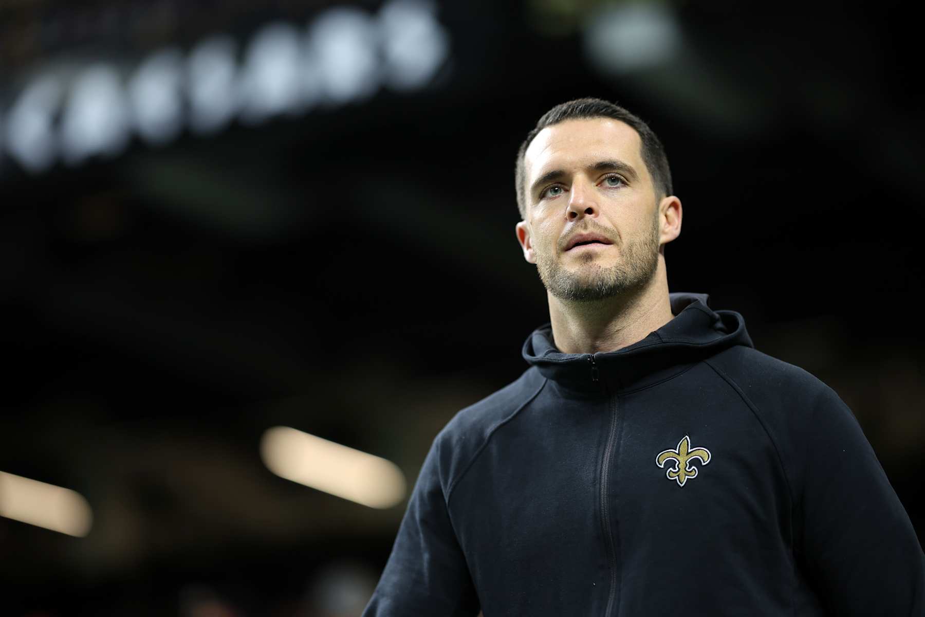 NEW ORLEANS, LOUISIANA - DECEMBER 15: Derek Carr #4 of the New Orleans Saints reacts against the Washington Commanders during a game at Caesars Superdome on December 15, 2024 in New Orleans, Louisiana. (Photo by Jonathan Bachman/Getty Images)