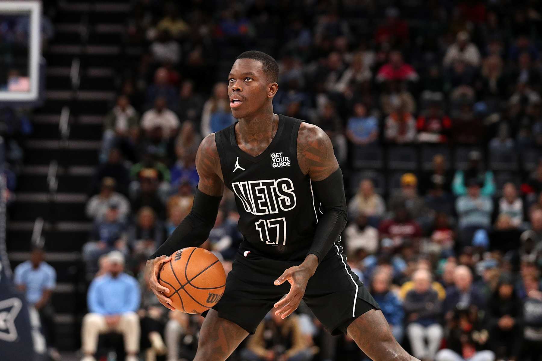 MEMPHIS, TENNESSEE - DECEMBER 13: Dennis Schroder #17 of the Brooklyn Nets handles the ball during the game against the Memphis Grizzlies at FedExForum on December 13, 2024 in Memphis, Tennessee. NOTE TO USER: User expressly acknowledges and agrees that, by downloading and or using this photograph, User is consenting to the terms and conditions of the Getty Images License Agreement. (Photo by Justin Ford/Getty Images)
