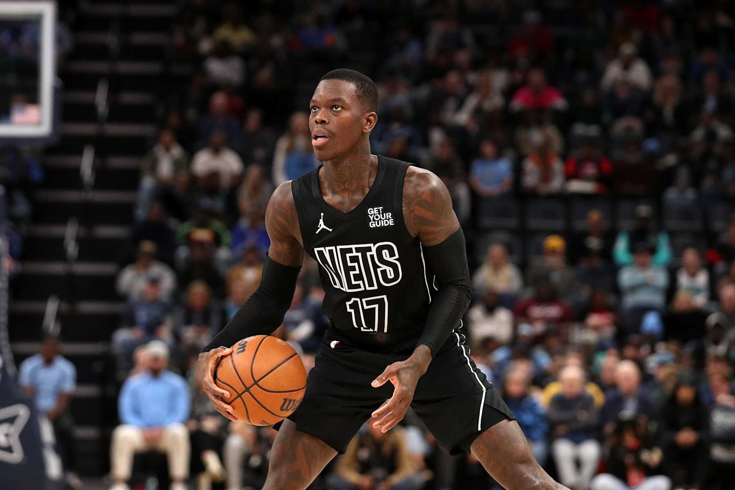 MEMPHIS, TENNESSEE - DECEMBER 13: Dennis Schroder #17 of the Brooklyn Nets handles the ball during the game against the Memphis Grizzlies at FedExForum on December 13, 2024 in Memphis, Tennessee. NOTE TO USER: User expressly acknowledges and agrees that, by downloading and or using this photograph, User is consenting to the terms and conditions of the Getty Images License Agreement. (Photo by Justin Ford/Getty Images)