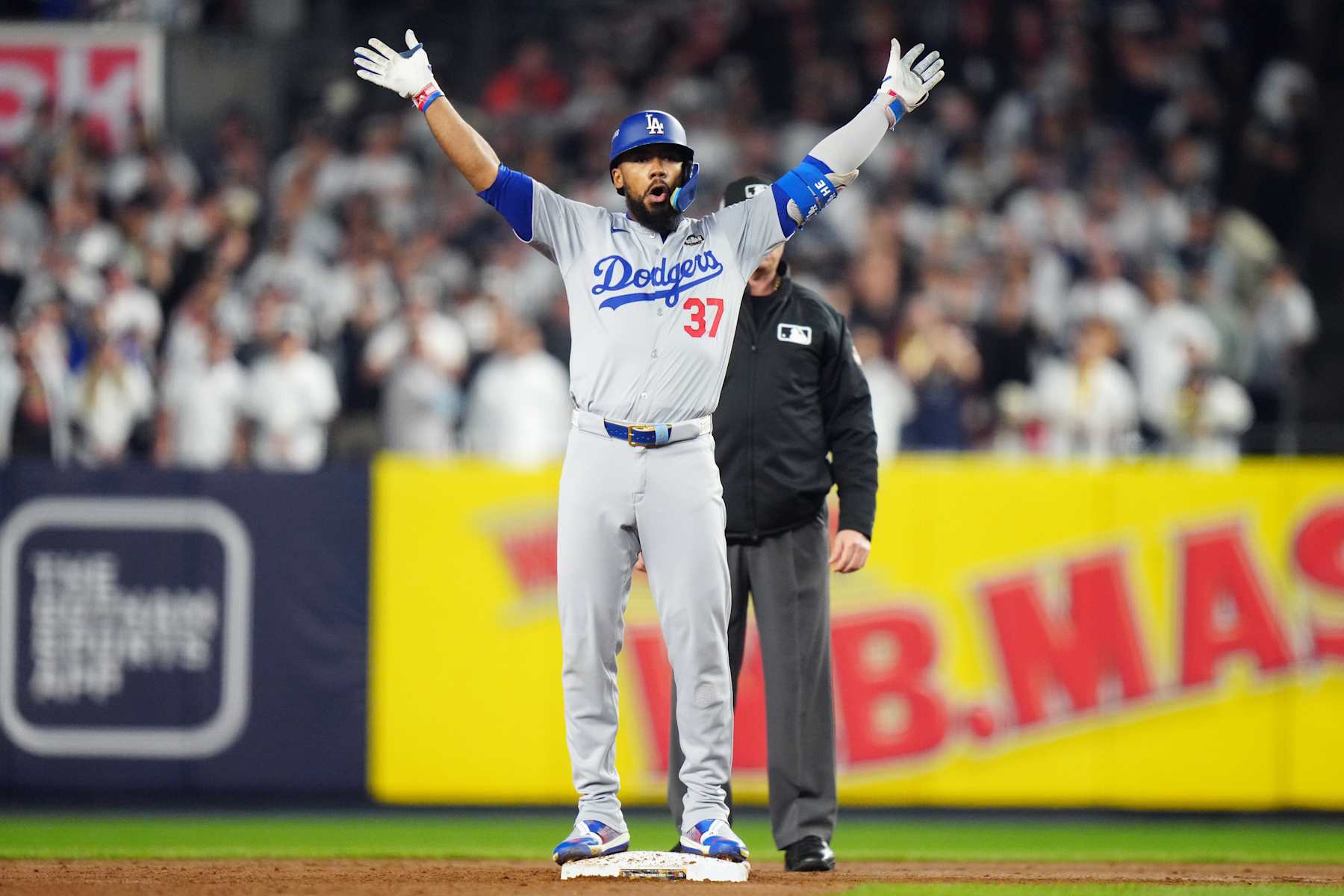 NEW YORK, NY - OCTOBER 30: Teoscar Hernández #37 of the Los Angeles Dodgers reacts after hitting a two-run double in the fifth inning during Game 5 of the 2024 World Series presented by Capital One between the Los Angeles Dodgers and the New York Yankees at Yankee Stadium on Wednesday, October 30, 2024 in New York, New York. (Photo by Daniel Shirey/MLB Photos via Getty Images)