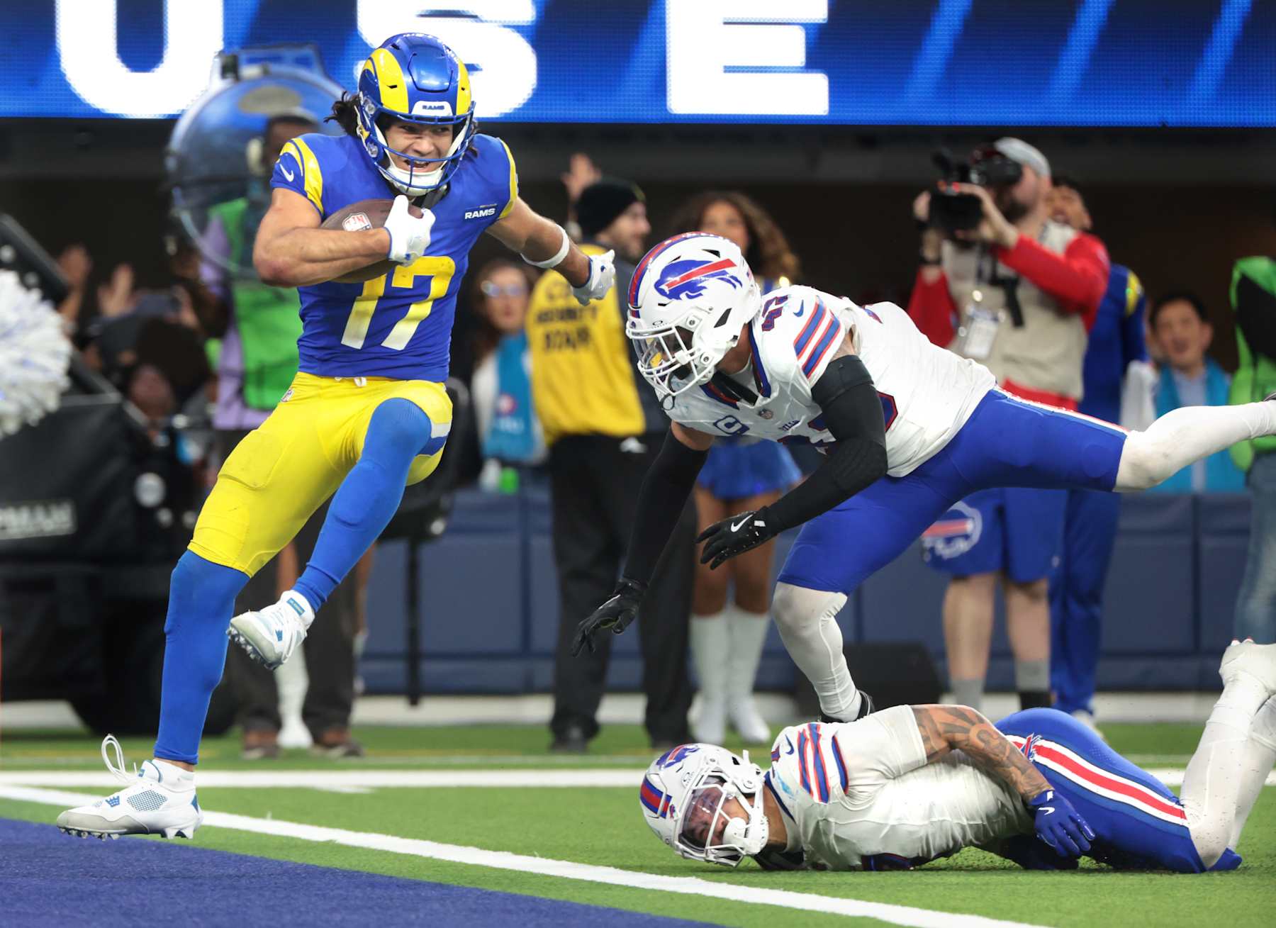 Inglewood, California December 8, 2024-Rams receiver Puka Nacua beats Bills linebacker Terrel Bernard (43) and cornerback Taron Johnson for a touchdown late in the fourth quarter at SoFi Stadium in Inglewood Sunday. (Wally Skalij/Los Angeles Times via Getty Images)