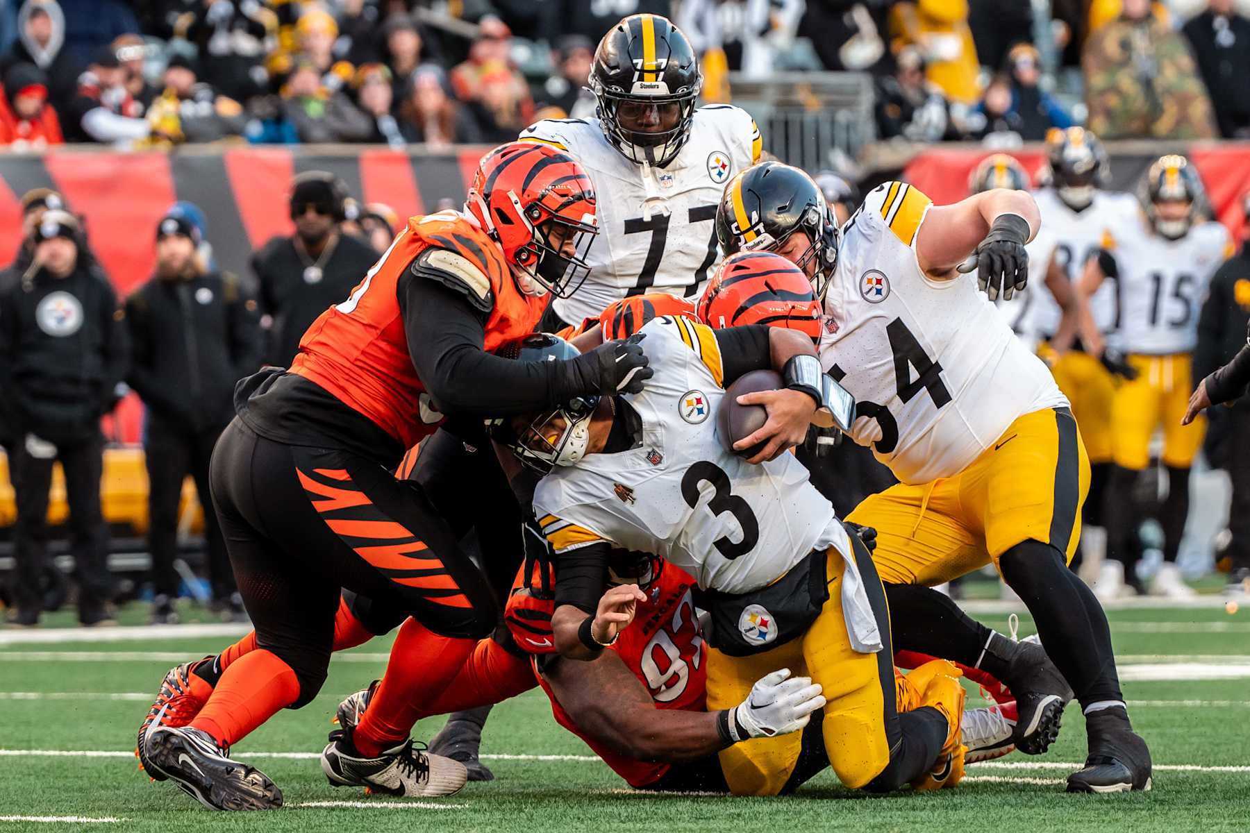 CINCINNATI, OHIO  - DECEMBER 1: Quarterback Russell Wilson #3 of the Pittsburgh Steelers is sacked during the fourth quarter of an NFL football game against the Cincinnati Bengals at Paycor Stadium on December 1, 2024 in Cincinnati, Ohio. (Photo by Todd Rosenberg/Getty Images)