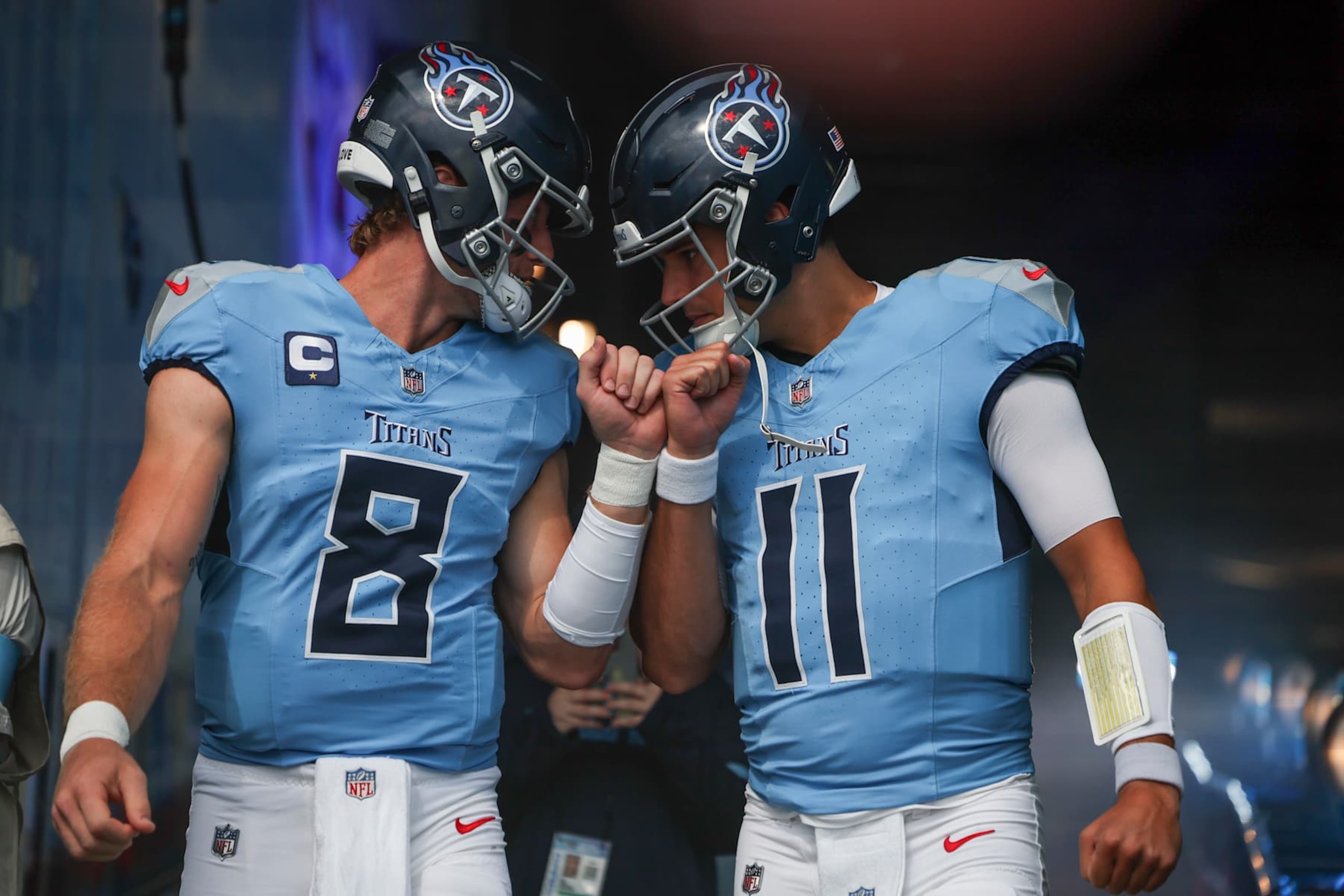 NASHVILLE, TENNESSEE - SEPTEMBER 22: Will Levis #8 of the Tennessee Titans and Mason Rudolph #11 of the Tennessee Titans interact prior to an NFL football game against the Green Bay Packers at Nissan Stadium on September 22, 2024 in Nashville, Tennessee. (Photo by Kara Durrette/Getty Images)