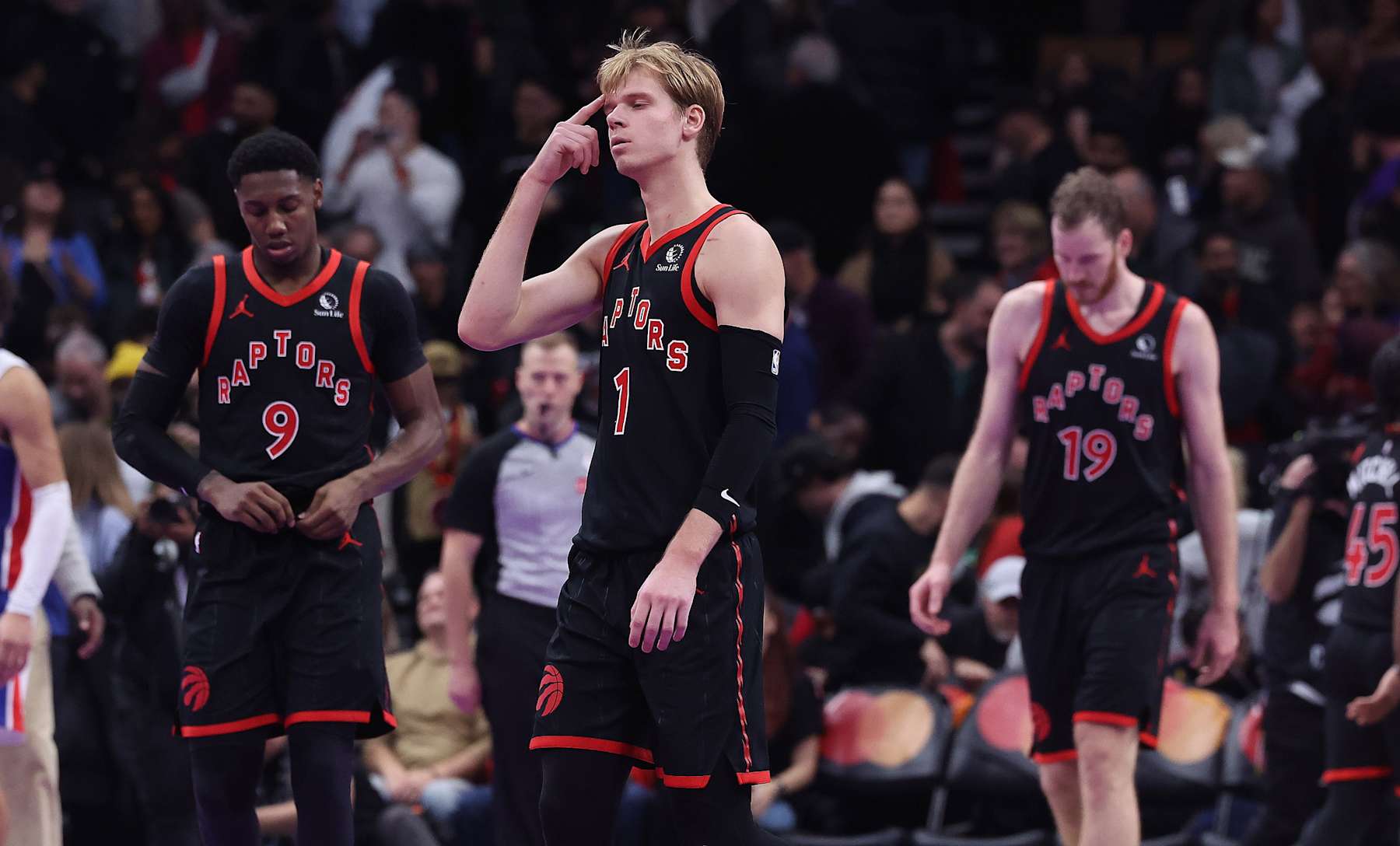 TORONTO, ON- NOVEMBER 15  -  Toronto Raptors guard Gradey Dick (1), Toronto Raptors guard RJ Barrett (9), and Toronto Raptors center Jakob Poeltl (19) walk off the court as the Toronto Raptors fall to the Detroit Pistons 99-95 at Scotiabank Arena in Toronto. November 15, 2024. (Photo by Steve Russell/Toronto Star via Getty Images)