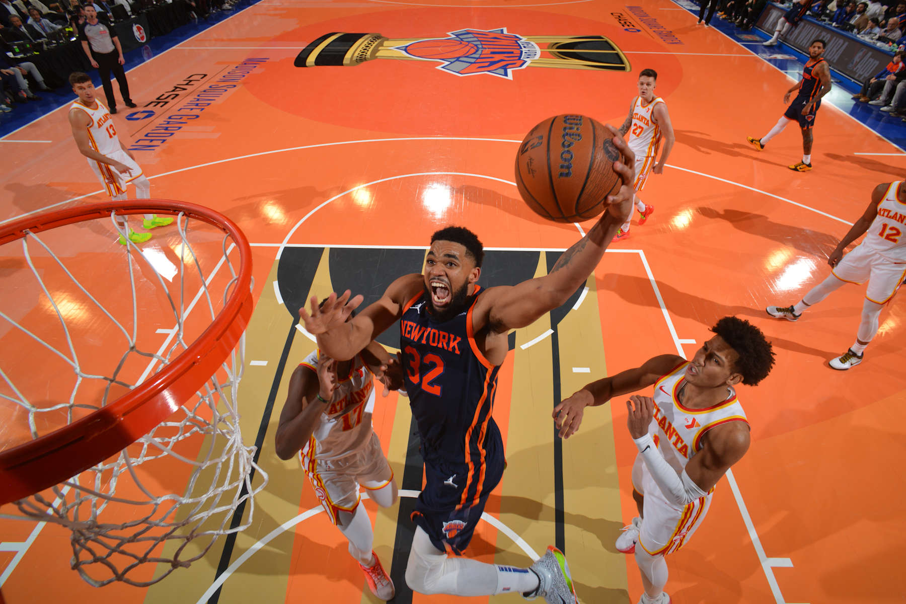 NEW YORK, NY - DECEMBER 11: Karl-Anthony Towns #32 of the New York Knicks dunks the ball during the game against the Atlanta Hawks during the Emirates NBA Cup Quarterfinals on December 11, 2024 at Madison Square Garden in New York City, New York.  NOTE TO USER: User expressly acknowledges and agrees that, by downloading and or using this photograph, User is consenting to the terms and conditions of the Getty Images License Agreement. Mandatory Copyright Notice: Copyright 2024 NBAE  (Photo by Jesse D. Garrabrant/NBAE via Getty Images)