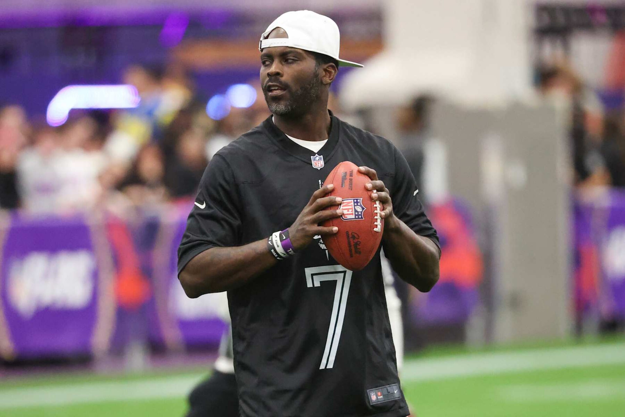 LAS VEGAS, NEVADA - FEBRUARY 09: Former NFL quarterback Michael Vick attempts a pass during a celebrity flag football game at the Mandalay Bay Convention Center on February 09, 2024 in Las Vegas, Nevada. (Photo by Ian Maule/Getty Images) LAS VEGAS, NEVADA - FEBRUARY 09: Former NFL quarterback Michael Vick attempts a pass during a celebrity flag football game at the Mandalay Bay Convention Center on February 09, 2024 in Las Vegas, Nevada. (Photo by Ian Maule/Getty Images)