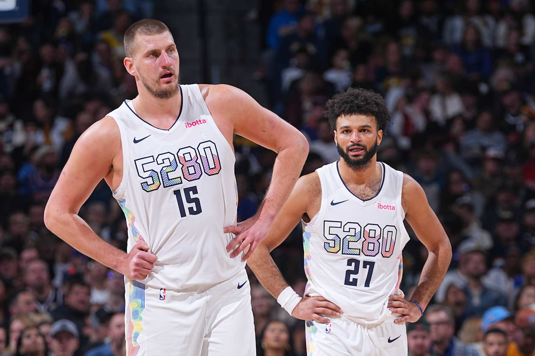 DENVER, CO - NOVEMBER 25: Nikola Jokic #15 and Jamal Murray #27 of the Denver Nuggets during the game against the New York Knicks on November 25, 2024 at Ball Arena in Denver, Colorado. NOTE TO USER: User expressly acknowledges and agrees that, by downloading and/or using this Photograph, user is consenting to the terms and conditions of the Getty Images License Agreement. Mandatory Copyright Notice: Copyright 2024 NBAE (Photo by Bart Young/NBAE via Getty Images)