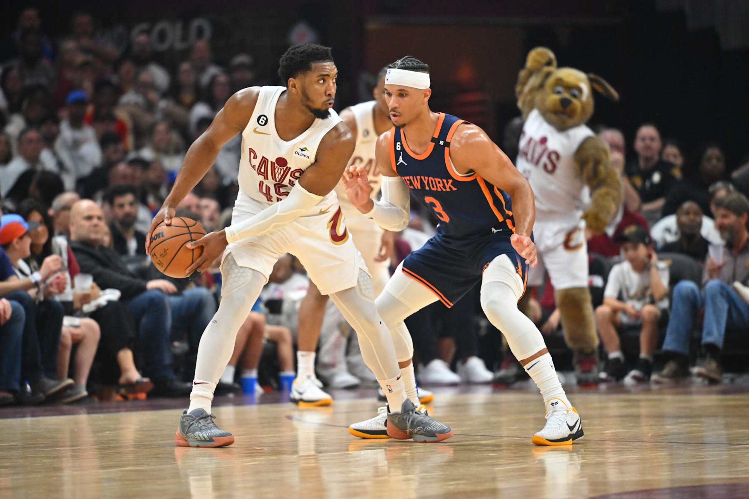 CLEVELAND, OHIO - APRIL 15: Donovan Mitchell #45 of the Cleveland Cavaliers posts up against Josh Hart #3 of the New York Knicks during the second quarter of Game One of the Eastern Conference First Round Playoffs at Rocket Mortgage Fieldhouse on April 15, 2023 in Cleveland, Ohio. NOTE TO USER: User expressly acknowledges and agrees that, by downloading and or using this photograph, User is consenting to the terms and conditions of the Getty Images License Agreement. (Photo by Jason Miller/Getty Images) CLEVELAND, OHIO - APRIL 15: Donovan Mitchell #45 of the Cleveland Cavaliers posts up against Josh Hart #3 of the New York Knicks during the second quarter of Game One of the Eastern Conference First Round Playoffs at Rocket Mortgage Fieldhouse on April 15, 2023 in Cleveland, Ohio. NOTE TO USER: User expressly acknowledges and agrees that, by downloading and or using this photograph, User is consenting to the terms and conditions of the Getty Images License Agreement. (Photo by Jason Miller/Getty Images)