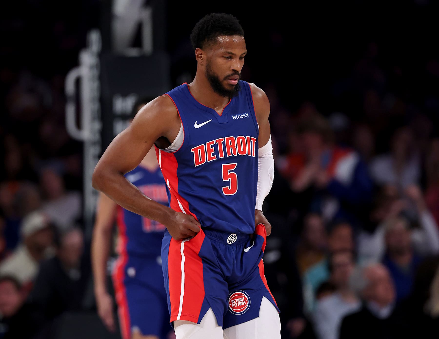 NEW YORK, NEW YORK - DECEMBER 07:  Malik Beasley #5 of the Detroit Pistons reacts during a time out in the second quarter against the New York Knicks at Madison Square Garden on December 07, 2024 in New York City. NOTE TO USER: User expressly acknowledges and agrees that, by downloading and or using this photograph, User is consenting to the terms and conditions of the Getty Images License Agreement. (Photo by Elsa/Getty Images)