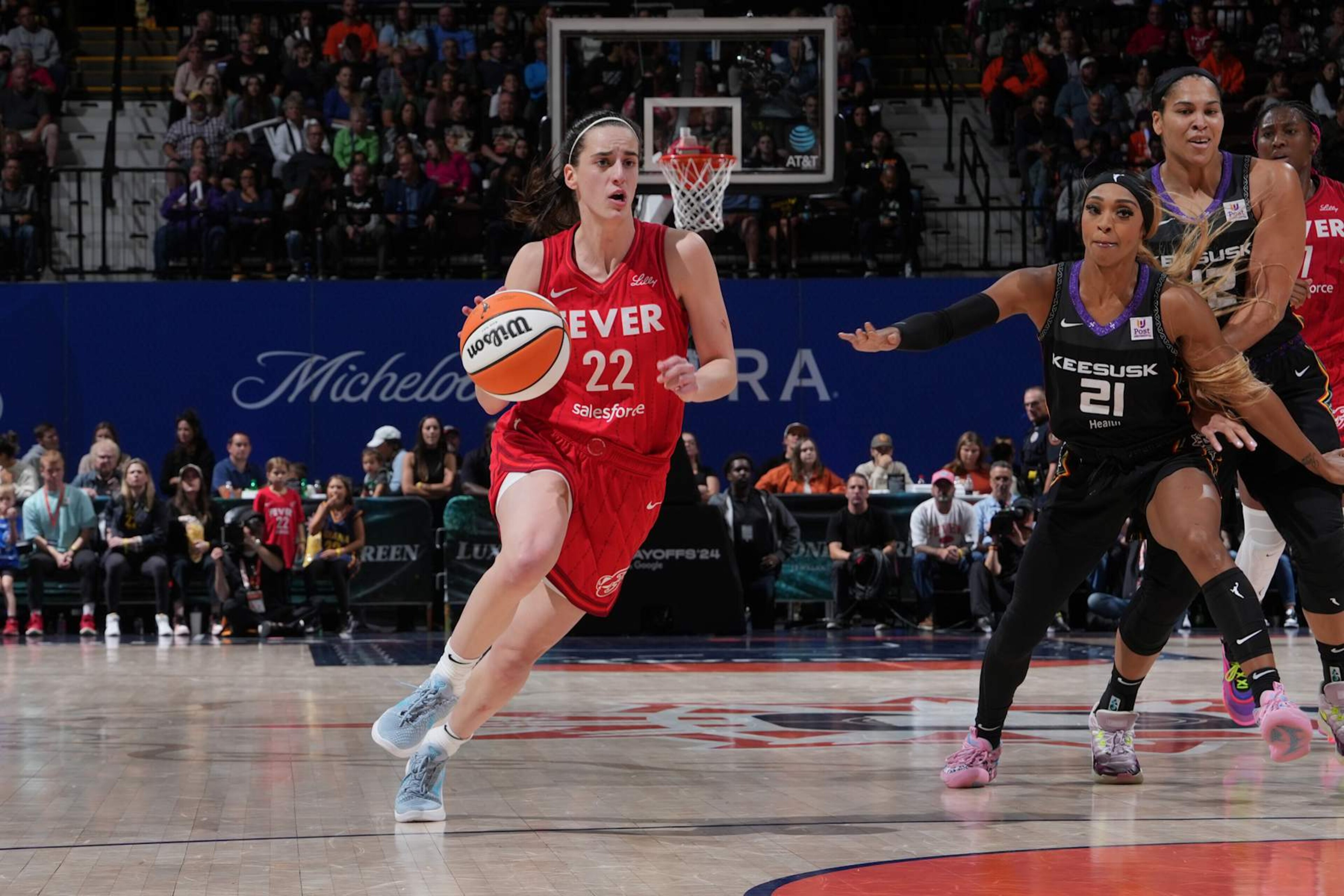 UNCASVILLE, CT - SEPTEMBER 25: Caitlin Clark #22 of the Indiana Fever drives to the basket during the game against the Connecticut Sun during Round one Game two of the 2024 WNBA Playoffs on September 25, 2024 at the Mohegan Sun Arena in Uncasville, Connecticut. NOTE TO USER: User expressly acknowledges and agrees that, by downloading and or using this photograph, User is consenting to the terms and conditions of the Getty Images License Agreement. Mandatory Copyright Notice: Copyright 2024 NBAE (Photo by Jesse D. Garrabrant/NBAE via Getty Images) UNCASVILLE, CT - SEPTEMBER 25: Caitlin Clark #22 of the Indiana Fever drives to the basket during the game against the Connecticut Sun during Round one Game two of the 2024 WNBA Playoffs on September 25, 2024 at the Mohegan Sun Arena in Uncasville, Connecticut. NOTE TO USER: User expressly acknowledges and agrees that, by downloading and or using this photograph, User is consenting to the terms and conditions of the Getty Images License Agreement. Mandatory Copyright Notice: Copyright 2024 NBAE (Photo by Jesse D. Garrabrant/NBAE via Getty Images)