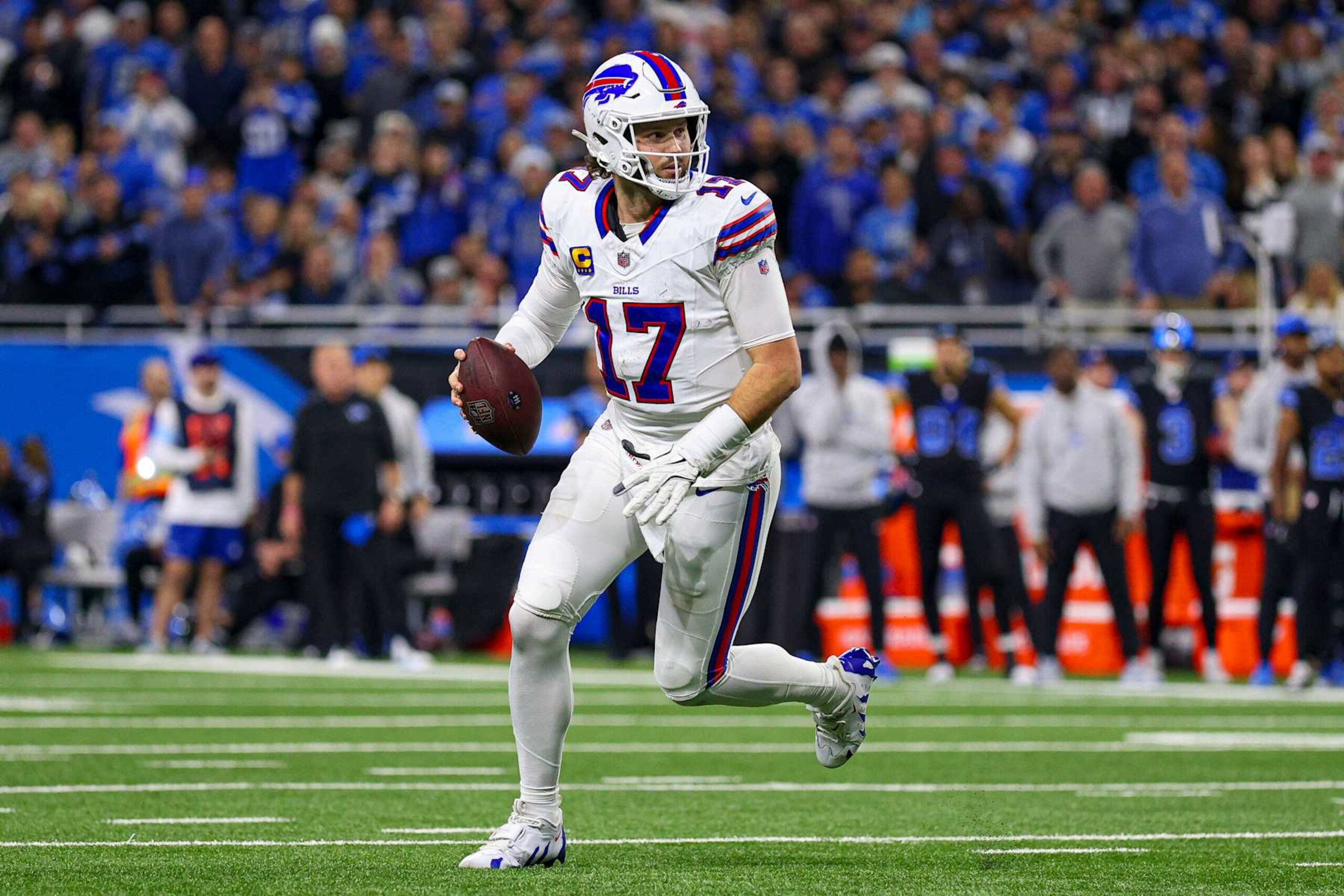 DETROIT, MICHIGAN - DECEMBER 15: Josh Allen #17 of the Buffalo Bills scrambles in the second quarter of a game against the Detroit Lions at Ford Field on December 15, 2024 in Detroit, Michigan. (Photo by Mike Mulholland/Getty Images)