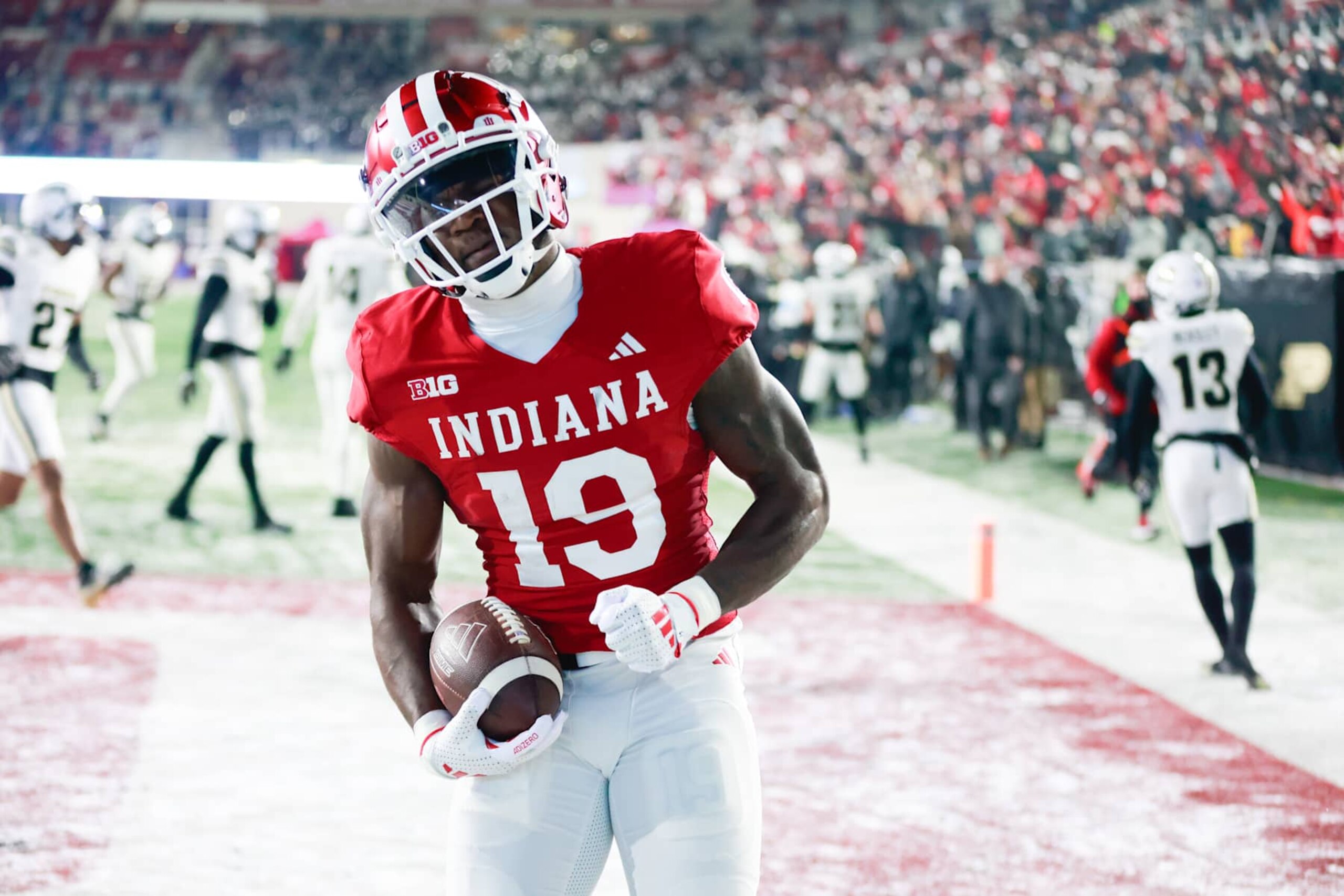 BLOOMINGTON, INDIANA, UNITED STATES - 2024/12/09: Indiana Hoosiers wide receiver Miles Cross (19) scores a touchdown during an NCAA football game against Purdue at Memorial Stadium. Final score : Indiana 66:0 Purdue. (Photo by Jeremy Hogan/SOPA Images/LightRocket via Getty Images)