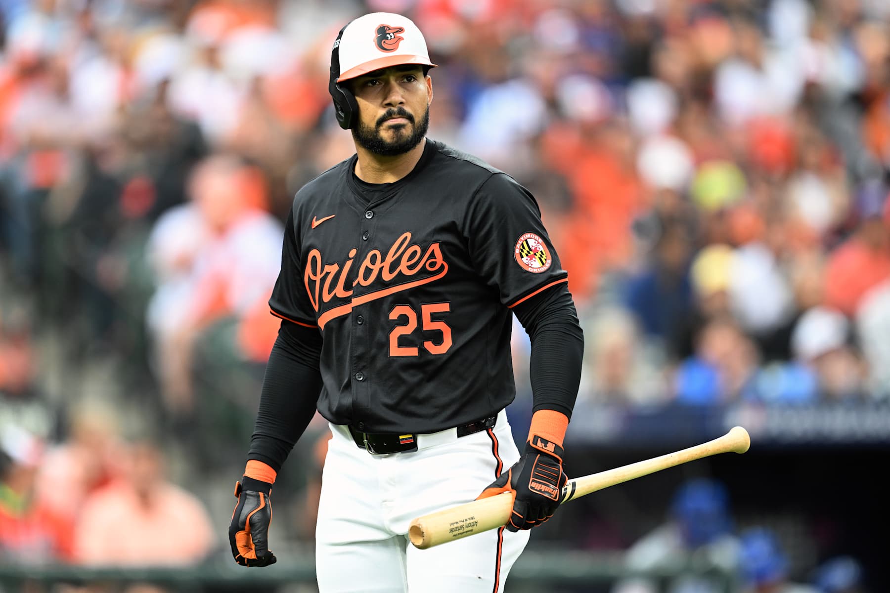 BALTIMORE, MARYLAND - OCTOBER 02: Anthony Santander #25 of the Baltimore Orioles reacts after striking out against the Kansas City Royals during the first inning of Game Two of the Wild Card Series at Oriole Park at Camden Yards on October 02, 2024 in Baltimore, Maryland.  (Photo by Greg Fiume/Getty Images)