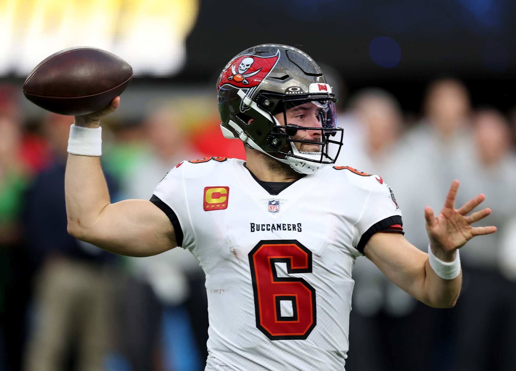 INGLEWOOD, CALIFORNIA - DECEMBER 15: Baker Mayfield #6 of the Tampa Bay Buccaneers prepares to pass during a 40-17 win over the Los Angeles Chargers at SoFi Stadium on December 15, 2024 in Inglewood, California. (Photo by Harry How/Getty Images)