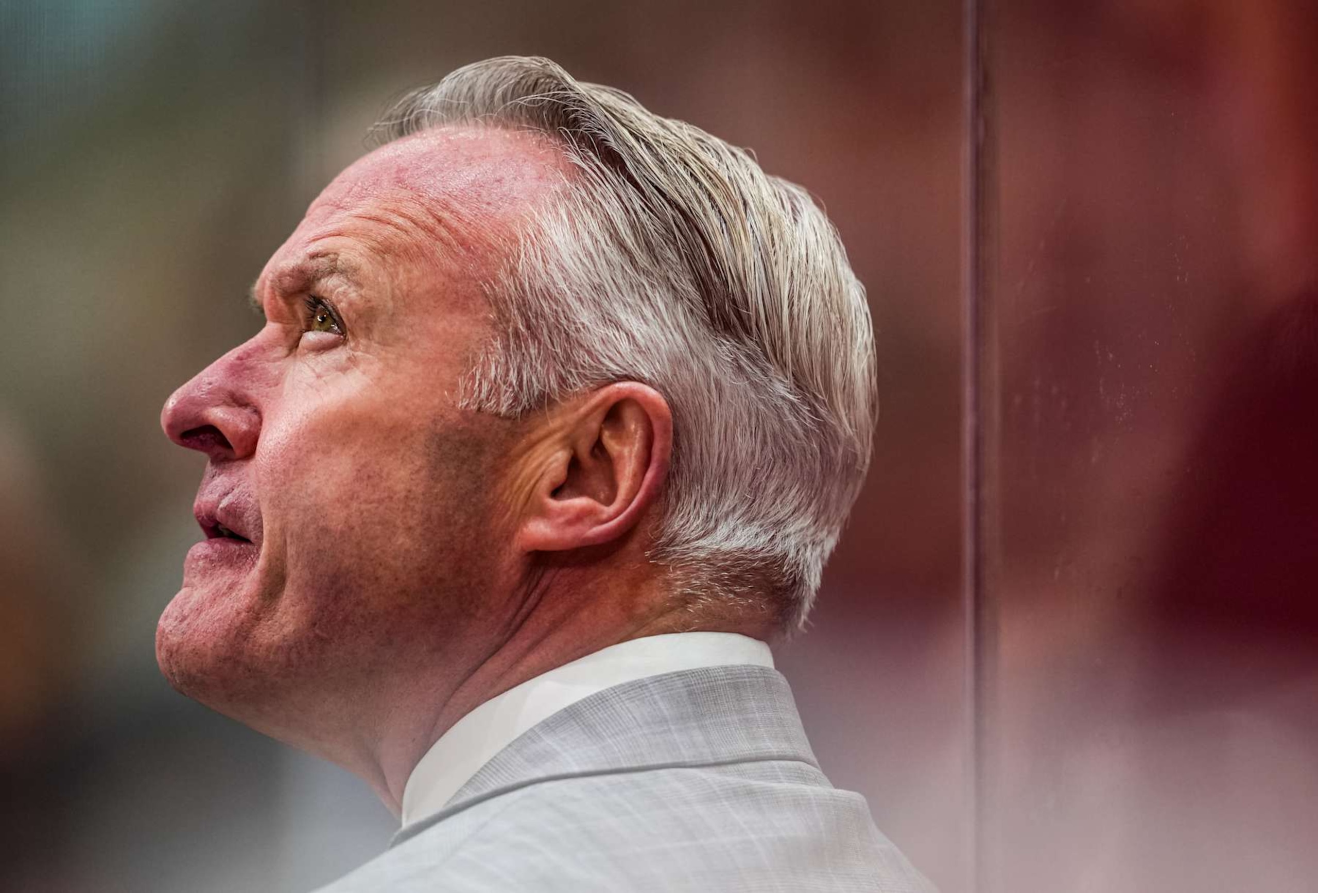 RALEIGH, NORTH CAROLINA - DECEMBER 15:  Head coach Dean Evason of the Columbus Blue Jackets looks on during the second period against the Carolina Hurricanes at Lenovo Center on December 15, 2024 in Raleigh, North Carolina.  (Photo by Josh Lavallee/NHLI via Getty Images)