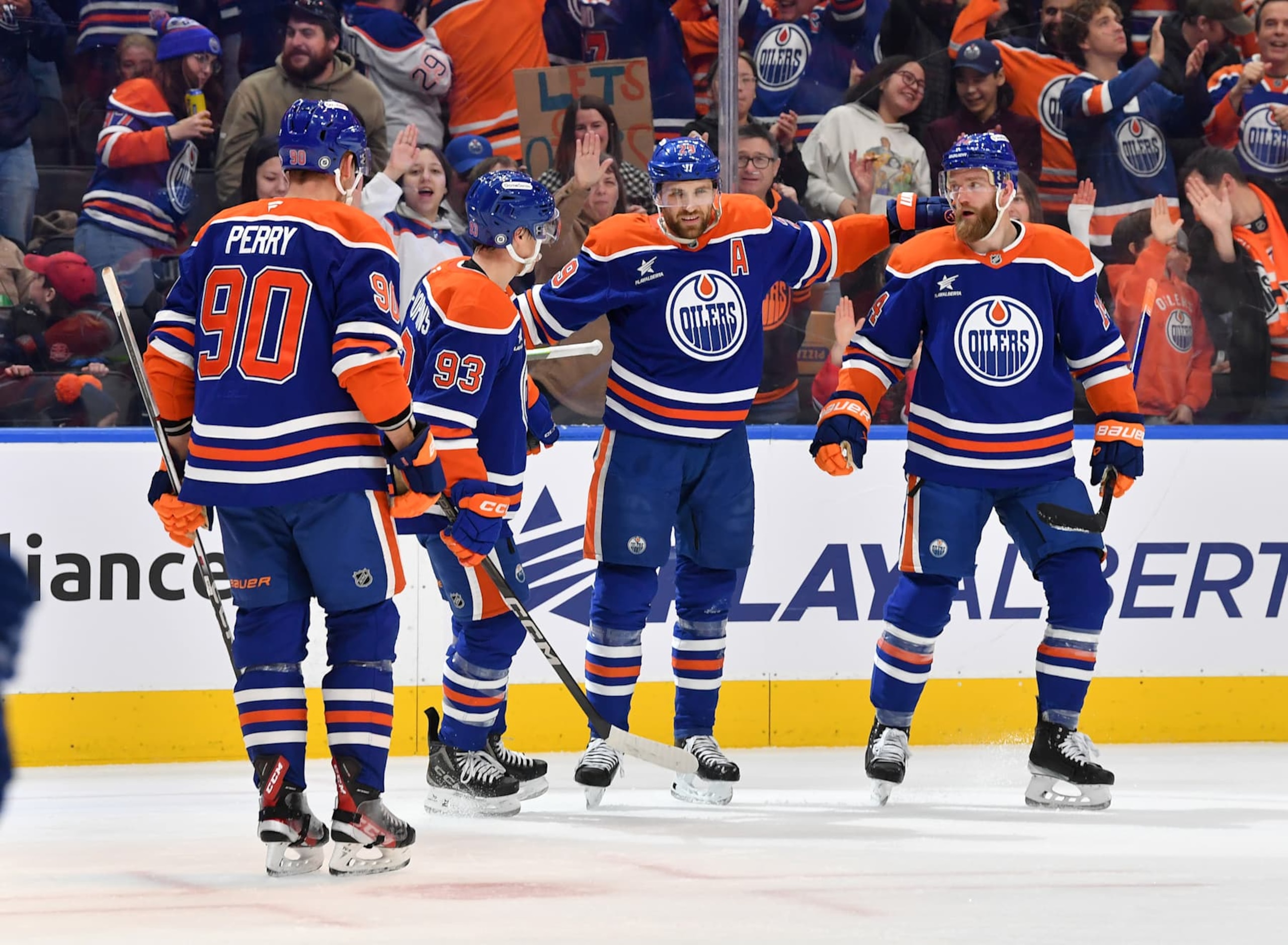 EDMONTON, CANADA - DECEMBER 16: Leon Draisaitl #29, Corey Perry #90, Ryan Nugent-Hopkins #93 and Mattias Ekholm #14 of the Edmonton Oilers celebrate a second-period goal against the Florida Panthers during the game at Rogers Place on December 16, 2024, in Edmonton, Alberta, Canada. (Photo by Andy Devlin/NHLI via Getty Images)