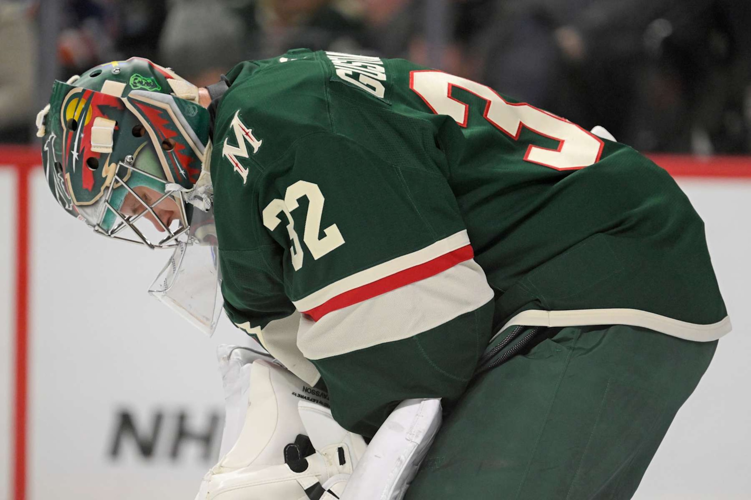 ST. PAUL, MN - DECEMBER 12:  Minnesota Wild goalie Filip Gustavsson (32) takes a breather during an NHL game between the Minnesota Wild and Edmonton Oilers on December 12, 2024, at Xcel Energy Center in St. Paul, MN.(Photo by Nick Wosika/Icon Sportswire via Getty Images)