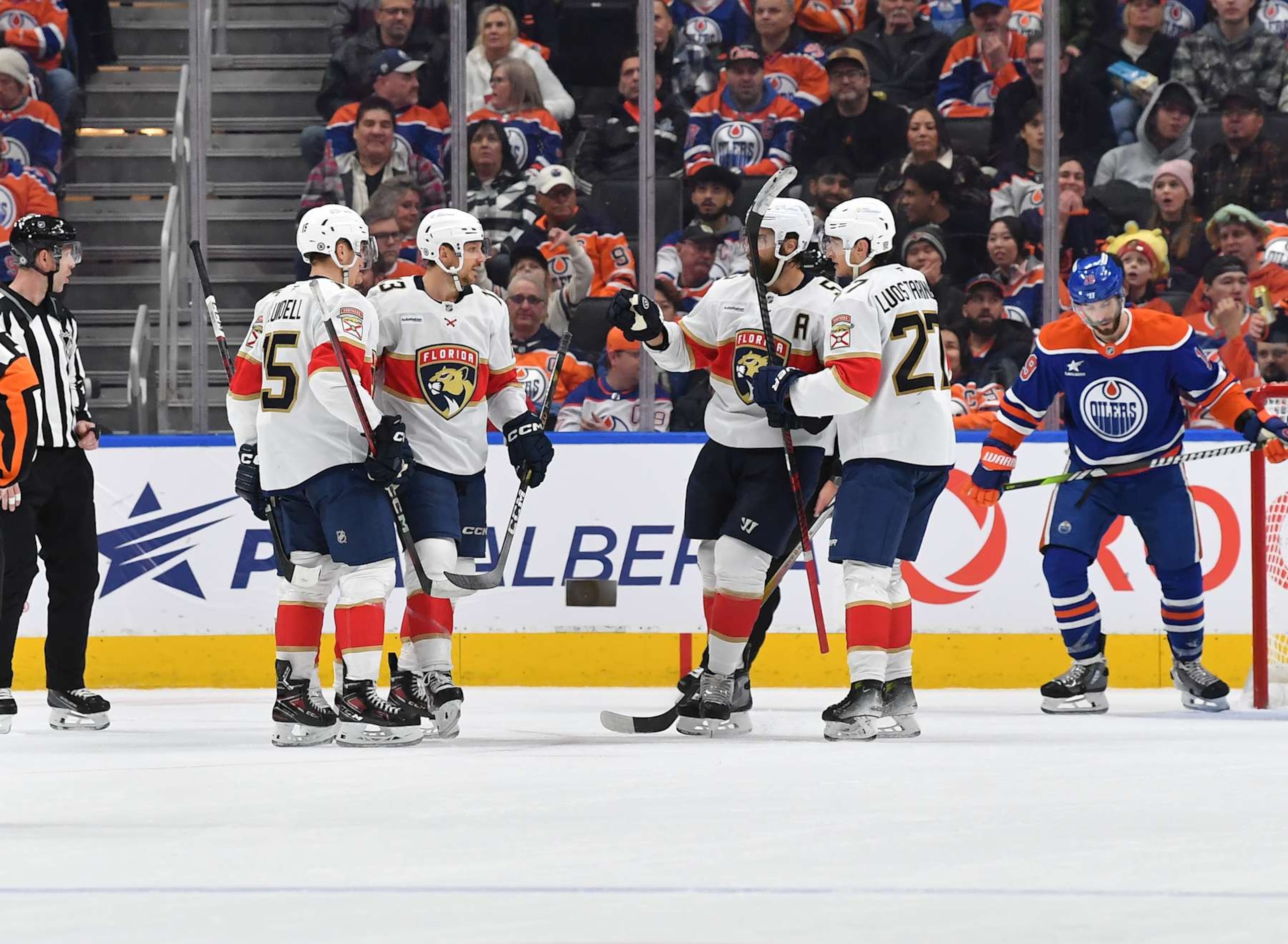 EDMONTON, CANADA - DECEMBER 16: Anton Lundell #15, Sam Reinhart #13, Aaron Ekblad #5 and Eetu Luostarinen #27 of the Florida Panthers celebrate a second-period goal against the Edmonton Oilers during the game at Rogers Place on December 16, 2024, in Edmonton, Alberta, Canada. (Photo by Andy Devlin/NHLI via Getty Images)