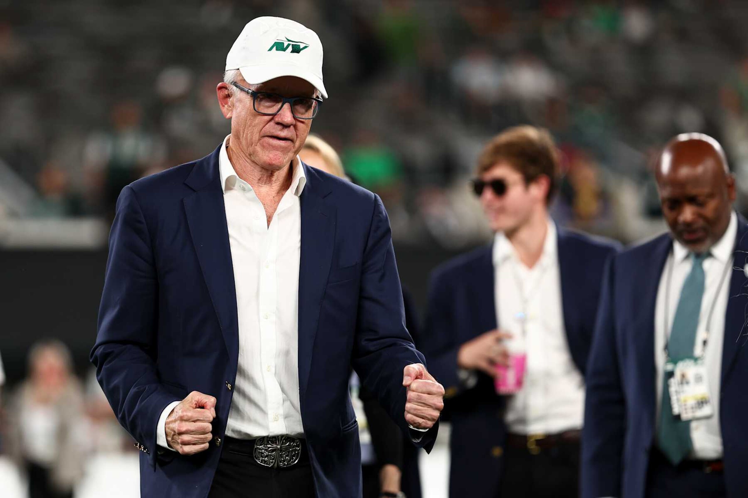 EAST RUTHERFORD, NEW JERSEY - OCTOBER 31: Owner Woody Johnson of the New York Jets stands on the field prior to an NFL football game against the Houston Texansh, Thursday at MetLife Stadium on October 31, 2024 in East Rutherford, NJ. (Photo by Kevin Sabitus/Getty Images)