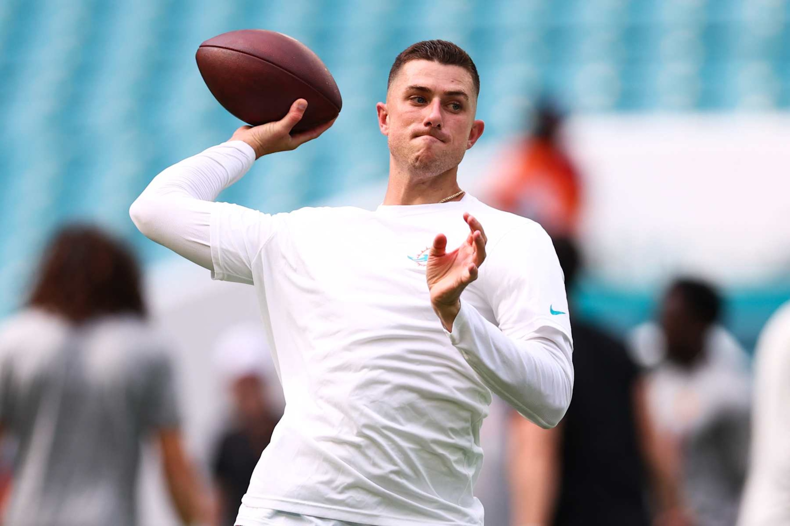 MIAMI GARDENS, FLORIDA - AUGUST 17: Mike White #14 of the Miami Dolphins warms up prior to a preseason game against the Washington Commanders at Hard Rock Stadium on August 17, 2024 in Miami Gardens, Florida. (Photo by Megan Briggs/Getty Images)