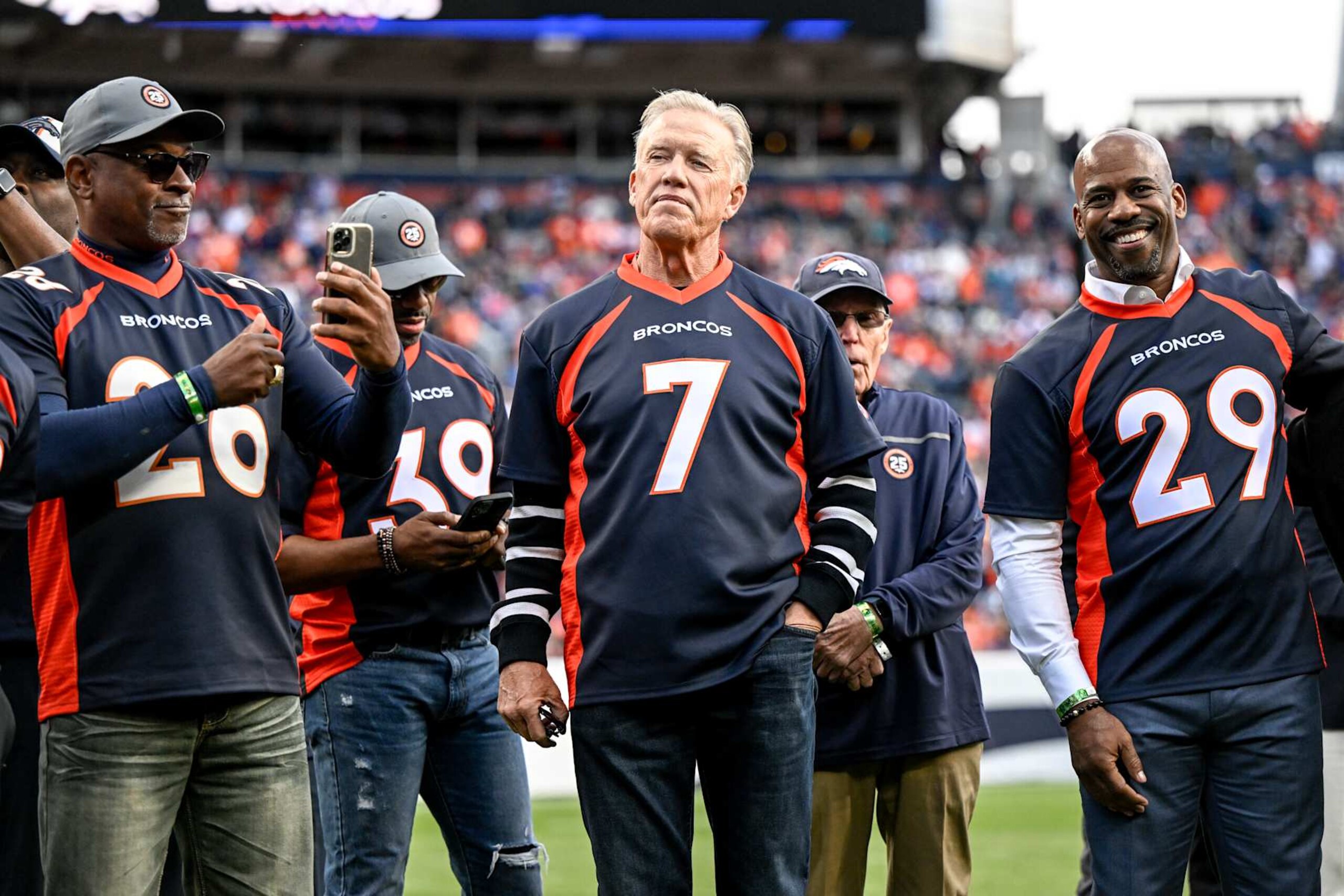 DENVER, CO - OCTOBER 23: Denver Broncos great John Elway sports his classic No. 7 jersey during a halftime celebrations celebrating the teams Super Bowl XXXII win over the Green Bay Packers at Empower Field at Mile High in Denver on Sunday, October 23, 2022. (Photo by AAron Ontiveroz/MediaNews Group/The Denver Post via Getty Images)