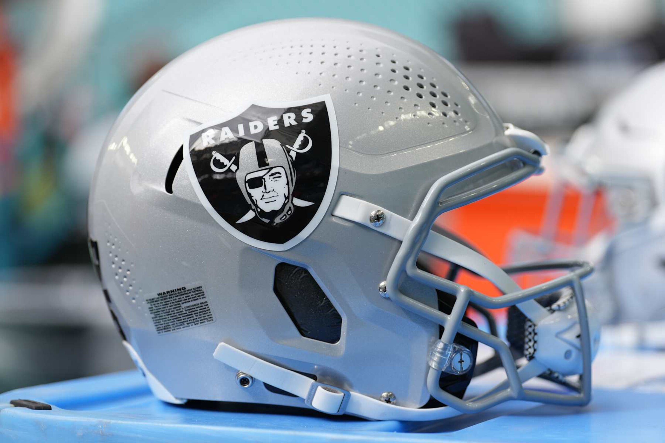 MIAMI GARDENS, FL - NOVEMBER 17: a Las Vegas Raiders helmet rests near the sidelines before the game between the Las Vegas Raiders and the Miami Dolphins on Sunday, November 17, 2024 at Hard Rock Stadium in Miami Gardens, Fla. (Photo by Peter Joneleit/Icon Sportswire via Getty Images)