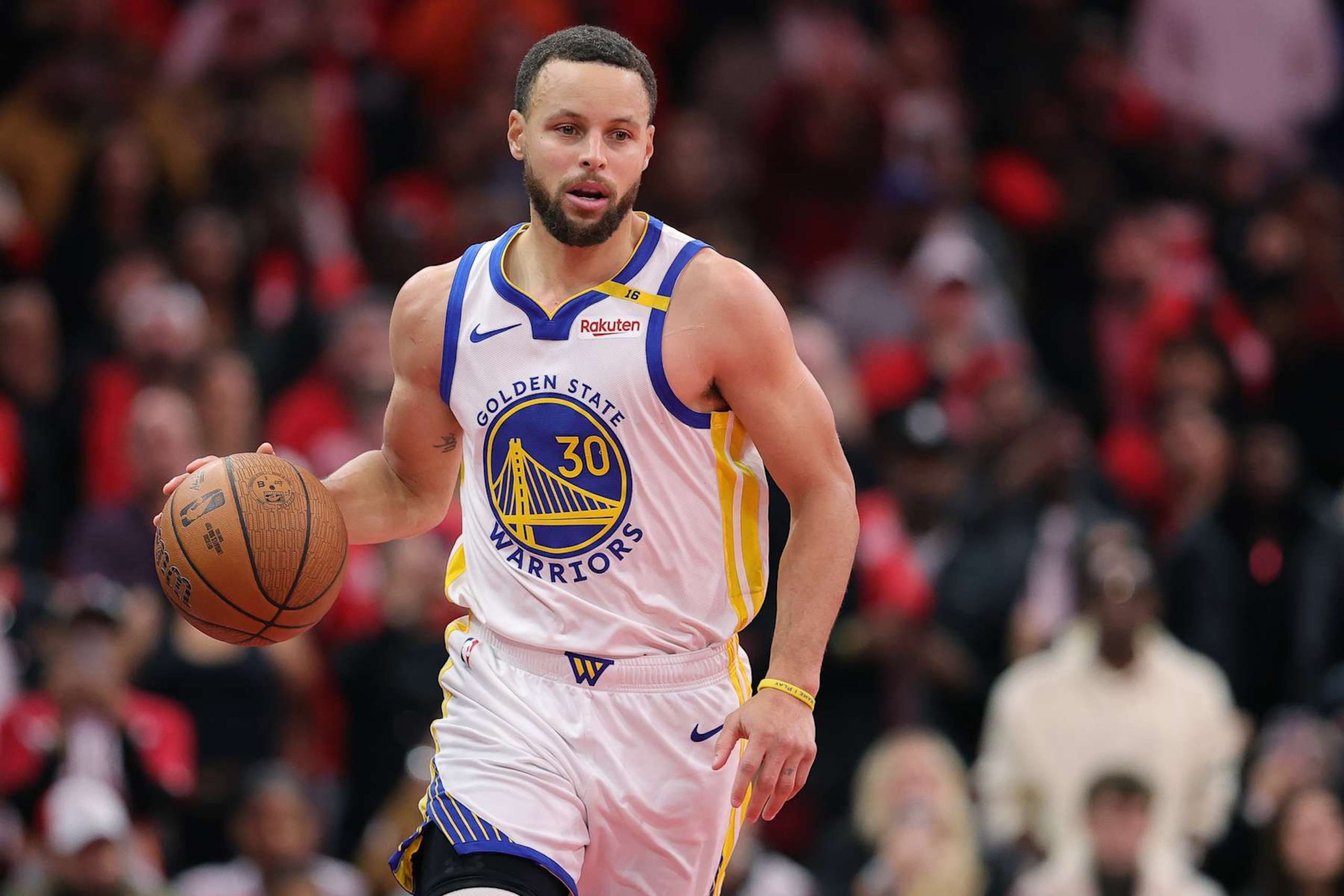 HOUSTON, TEXAS - DECEMBER 11: Stephen Curry #30 of the Golden State Warriors dribbles against the Houston Rockets during the second half of a quarterfinal game in the NBA Emirates Cup at Toyota Center on December 11, 2024 in Houston, Texas. NOTE TO USER: User expressly acknowledges and agrees that, by downloading and or using this photograph, User is consenting to the terms and conditions of the Getty Images License Agreement. (Photo by Alex Slitz/Getty Images)