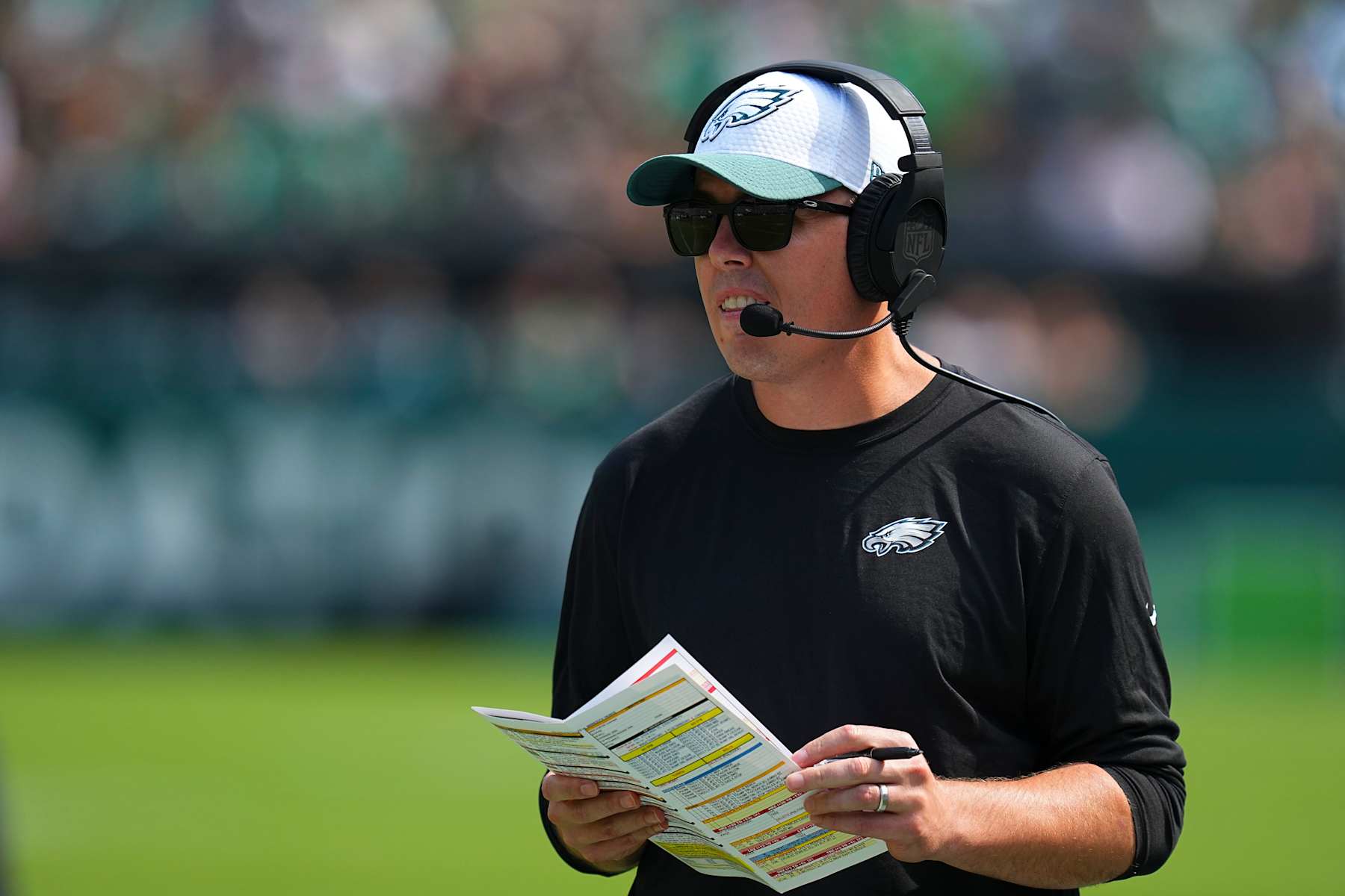 PHILADELPHIA, PENNSYLVANIA - AUGUST 24: Offensive coordinator Kellen Moore of the Philadelphia Eagles looks on against the Minnesota Vikings in the second half of the preseason game at Lincoln Financial Field on August 24, 2024 in Philadelphia, Pennsylvania. The Vikings defeated the Eagles 26-3. (Photo by Mitchell Leff/Getty Images)