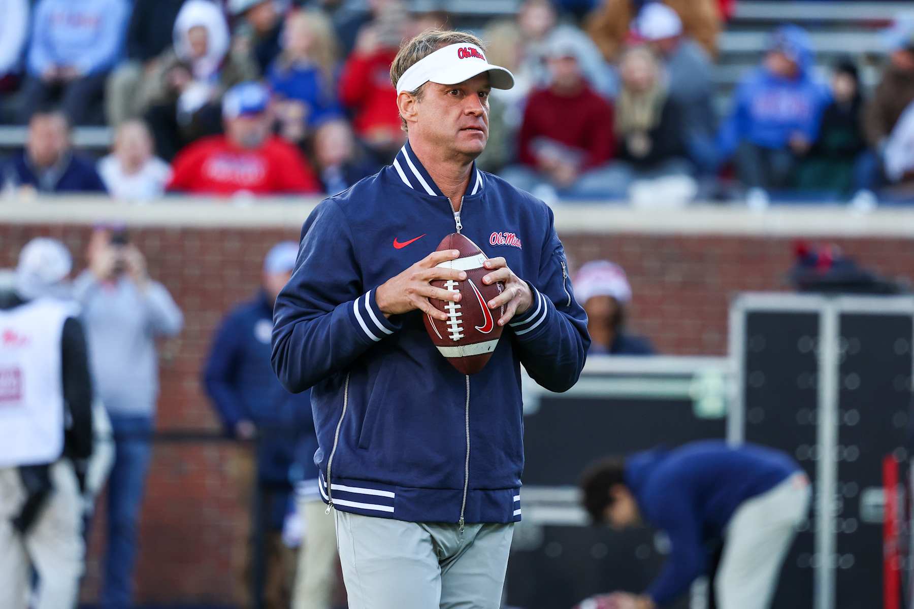 OXFORD, MISSISSIPPI - NOVEMBER 29: Lane Kiffin head coach of the Mississippi Rebels looks on during warm ups prior to the game against the Mississippi State Bulldogs at Vaught-Hemingway Stadium on November 29, 2024 in Oxford, Mississippi. (Photo by Wes Hale/Getty Images)